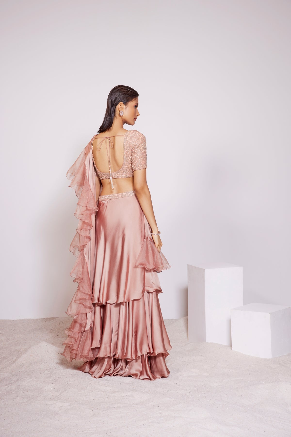 Light Copper Pre-draped Three Tiered Lehenga Ruffle Saree With a Plunging V-neck Hand Embroidered Blouse