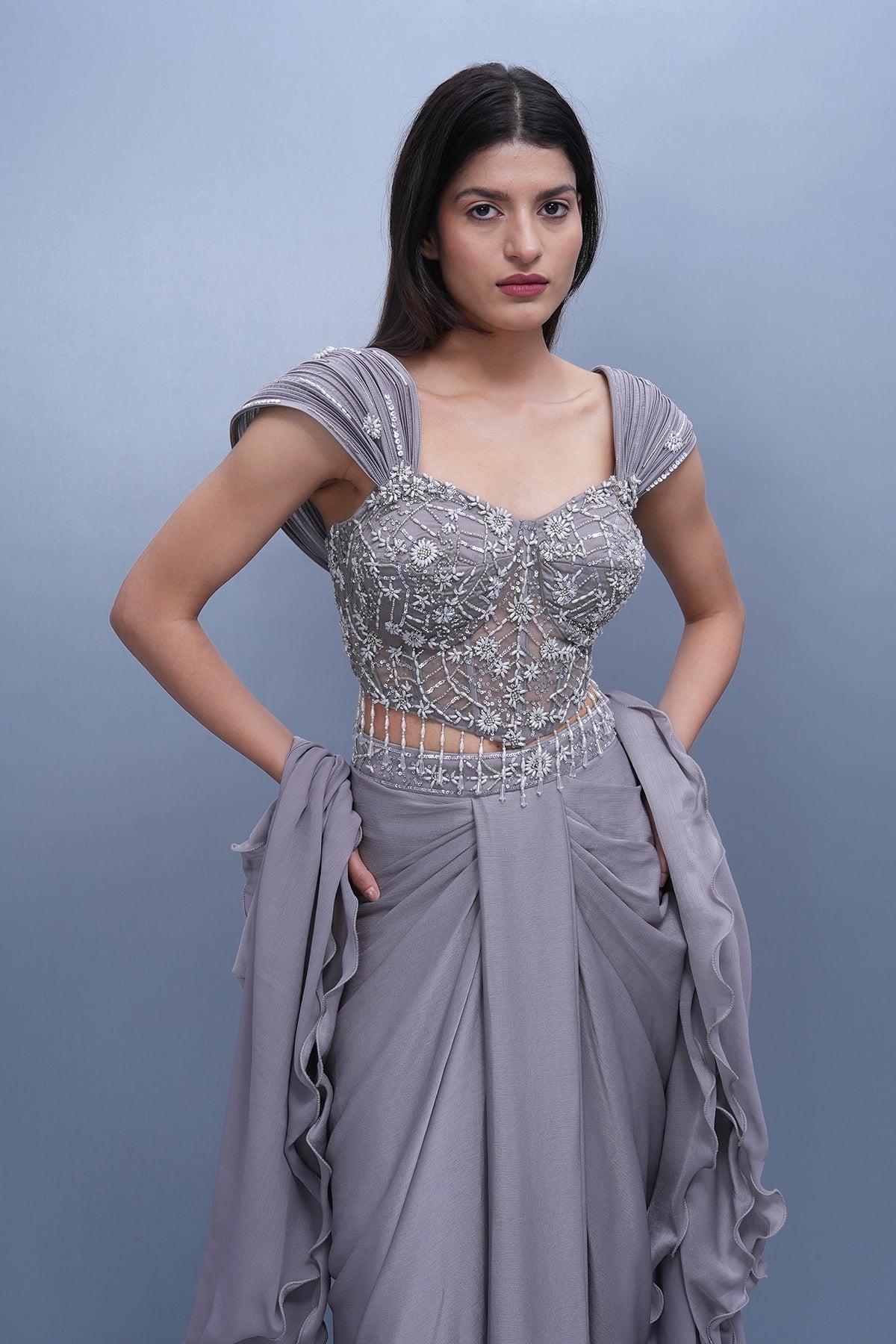 Lilac draped skirt set with embroidered wired blouse and ruffle dupatta