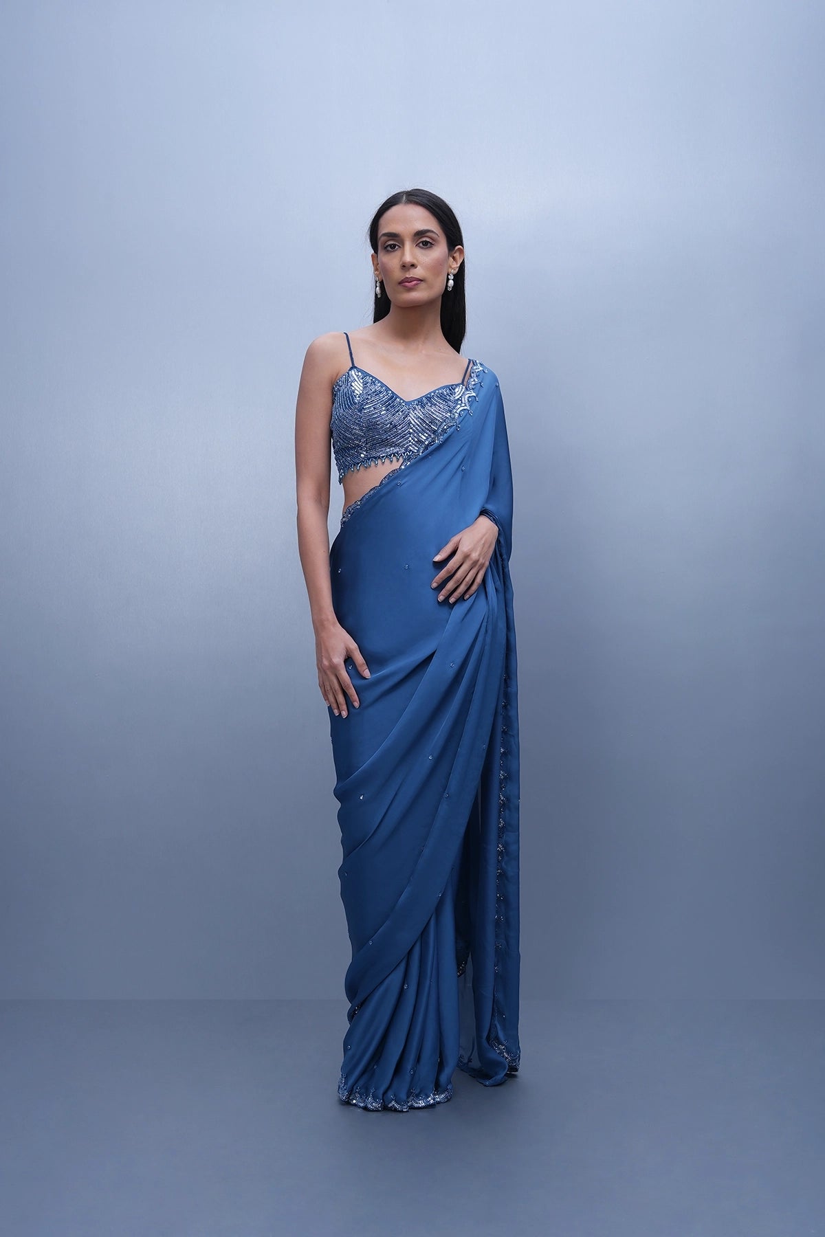 Cobalt blue satin saree with a spaghetti blouse