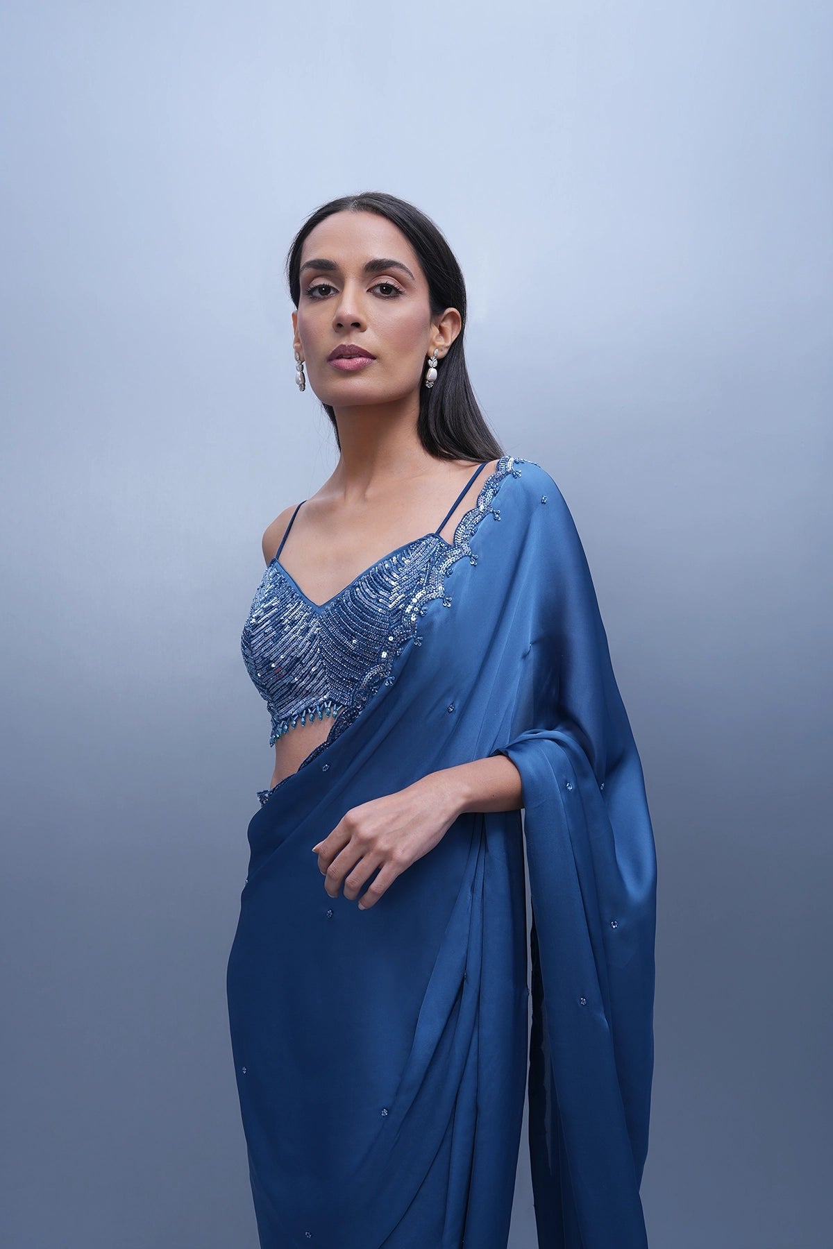 Cobalt blue satin saree with a spaghetti blouse