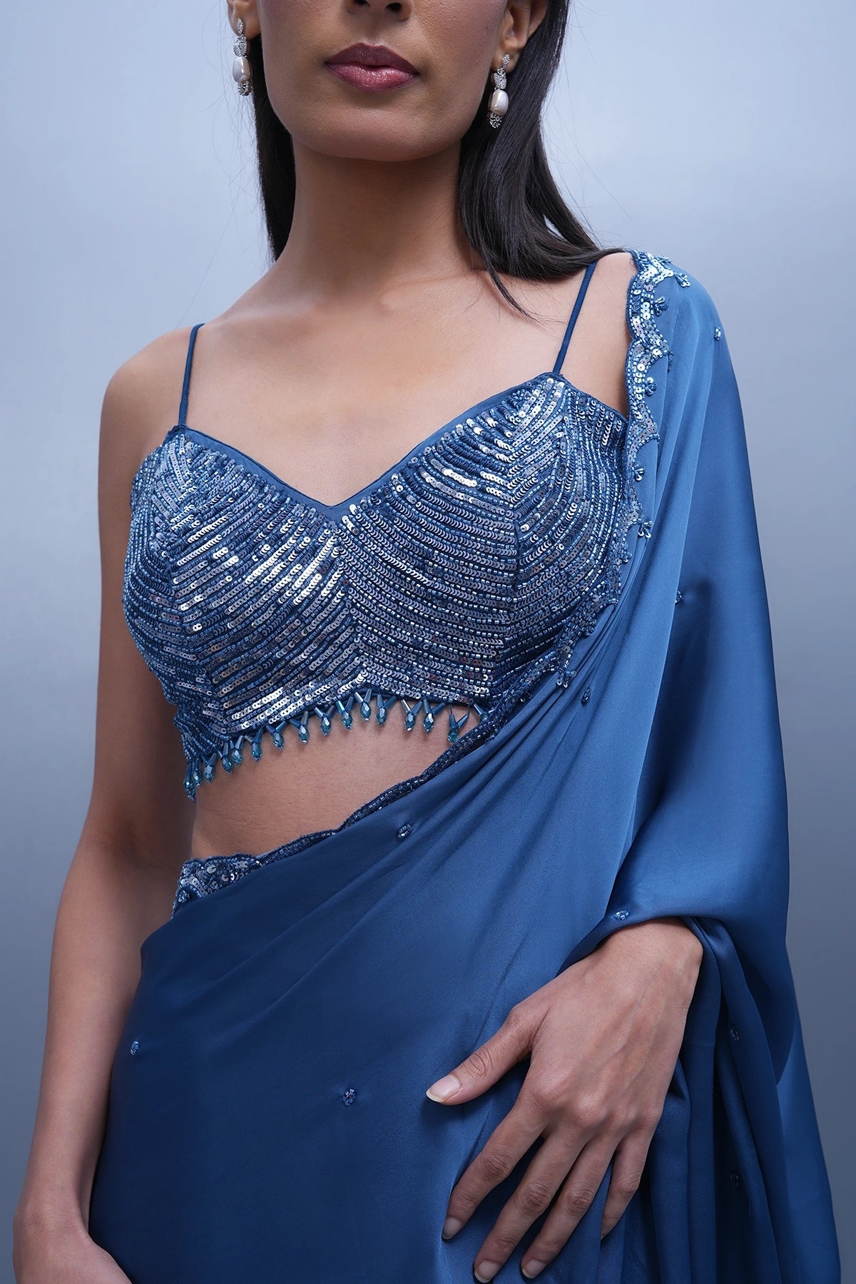 Cobalt blue satin saree with a spaghetti blouse