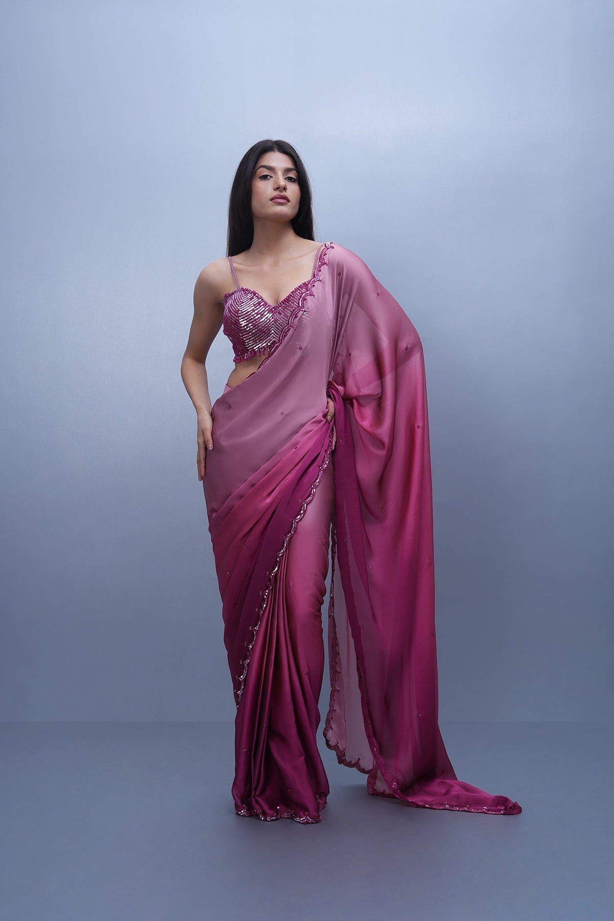 Pink shaded satin saree with a spaghetti blouse