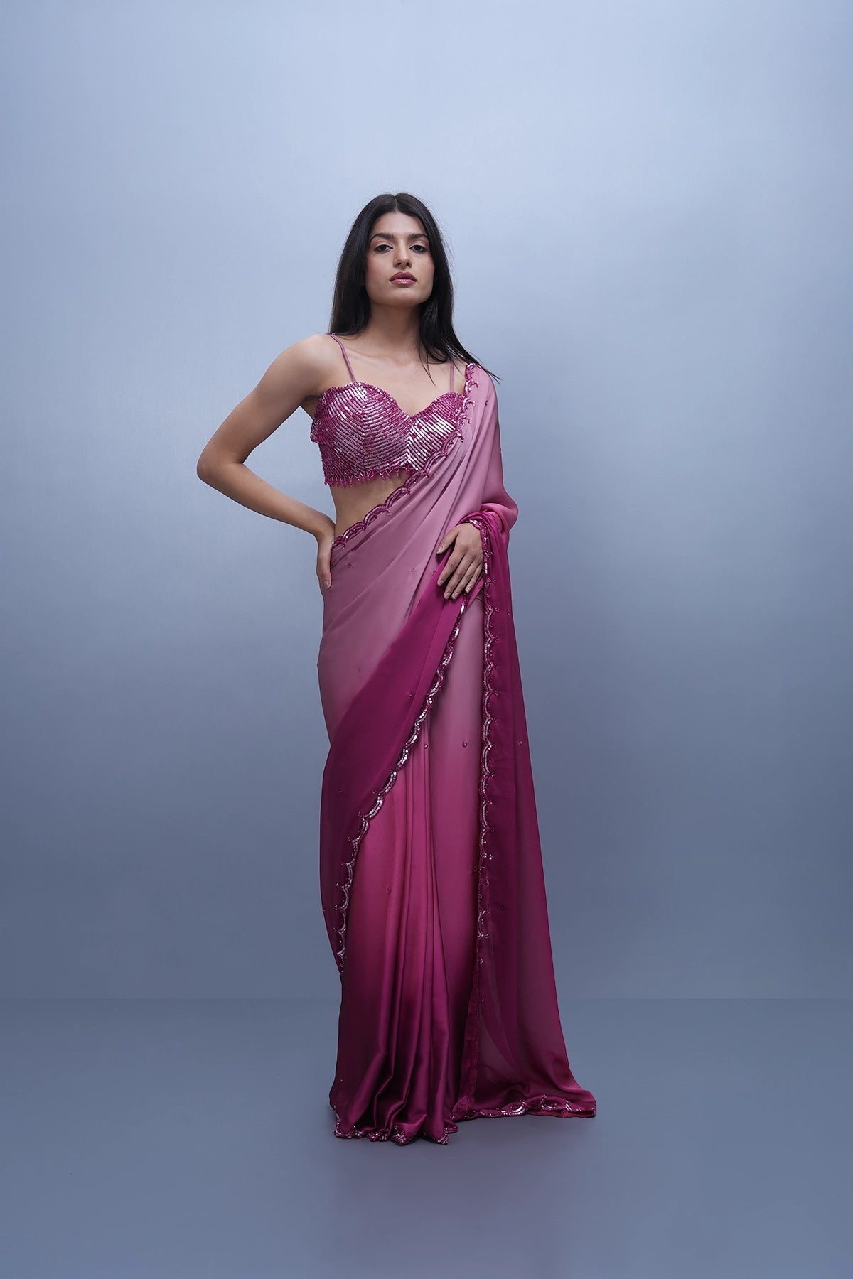 Pink shaded satin saree with a spaghetti blouse