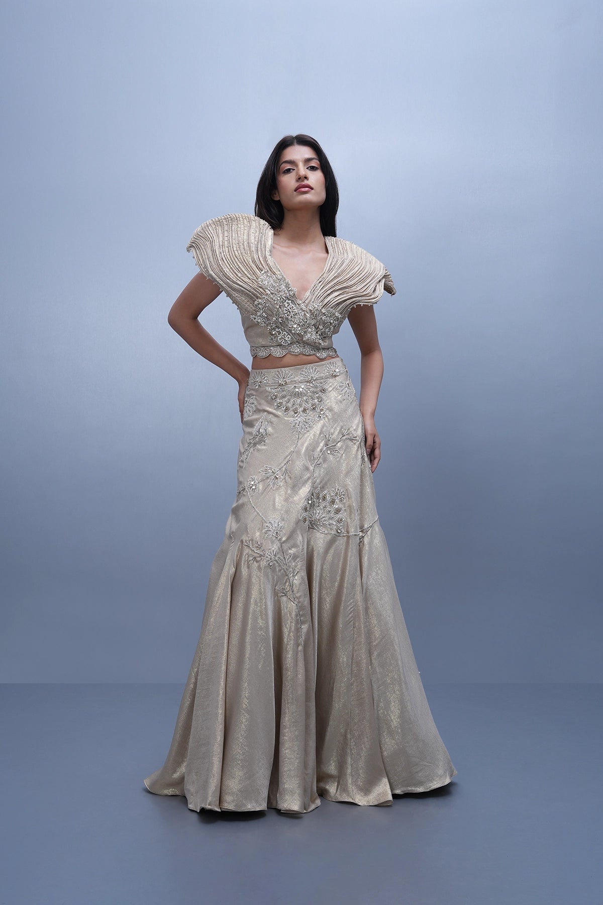 Ivory gold shine lehenga with dramatic wired blouse