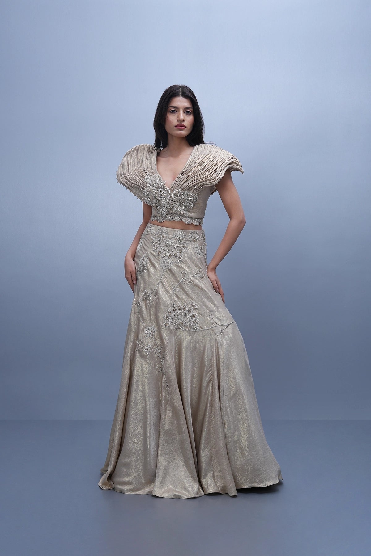 Ivory gold shine lehenga with dramatic wired blouse