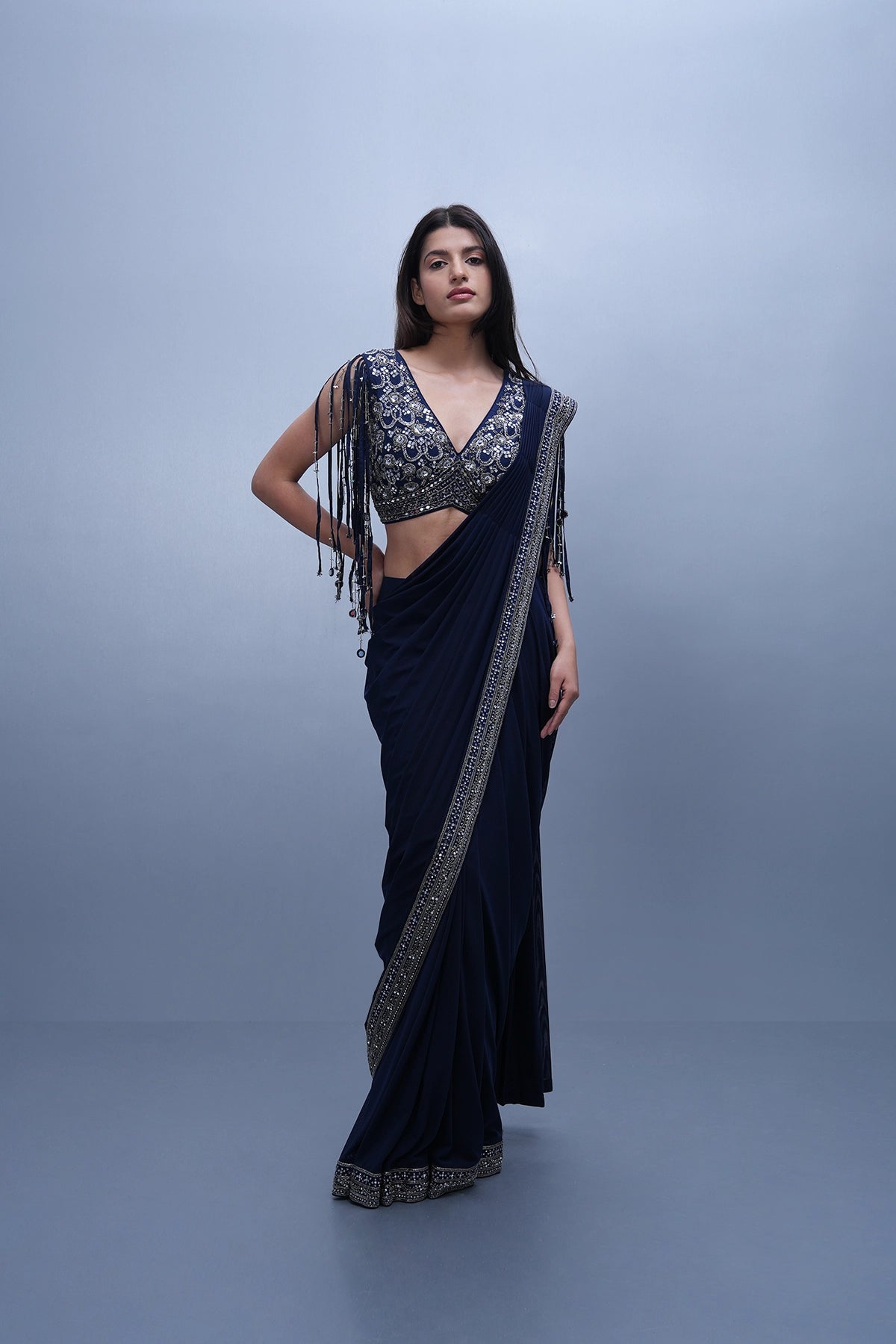 Navy blue pre-draped saree set with a blouse having fringes