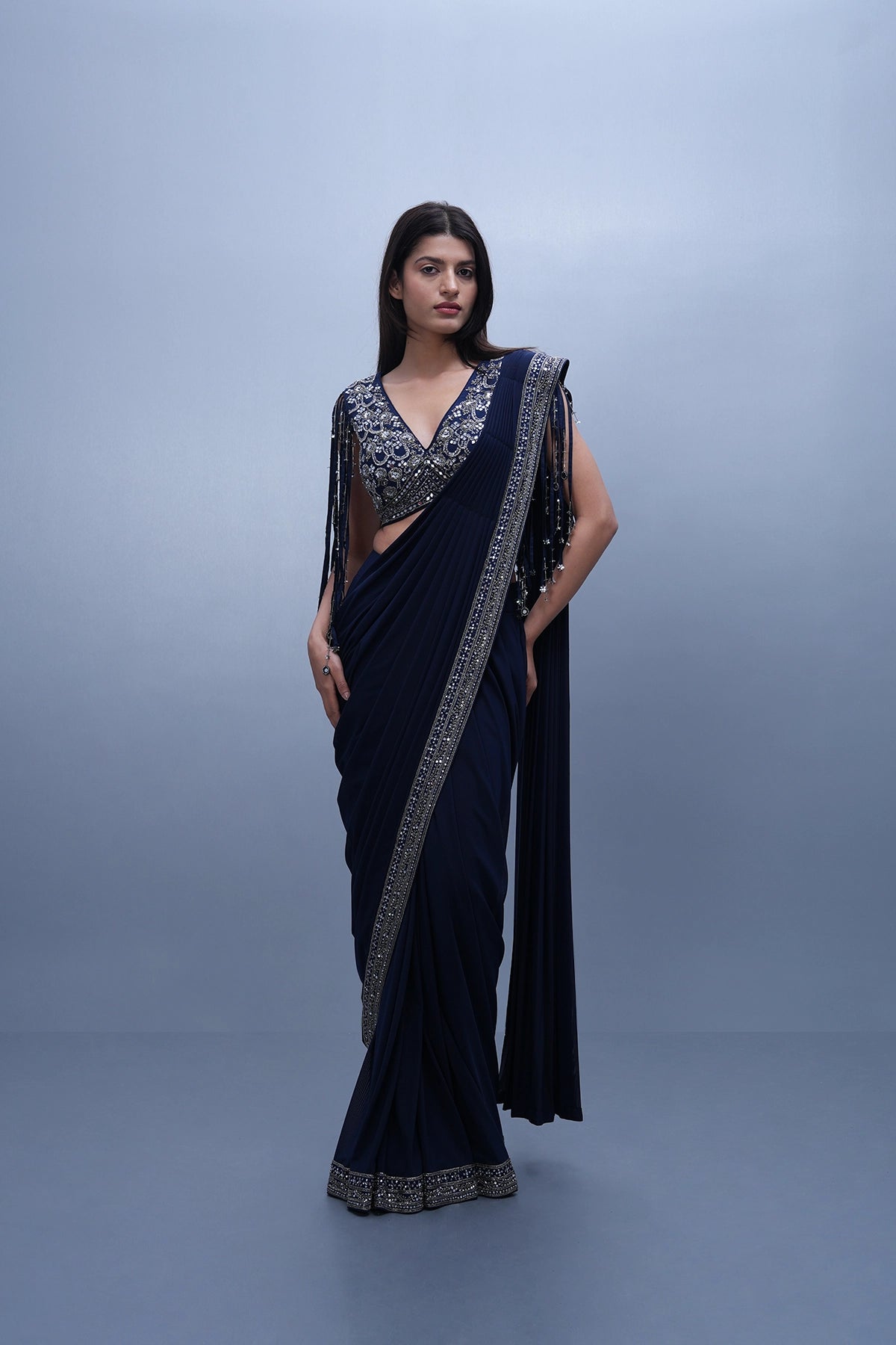Navy blue pre-draped saree set with a blouse having fringes