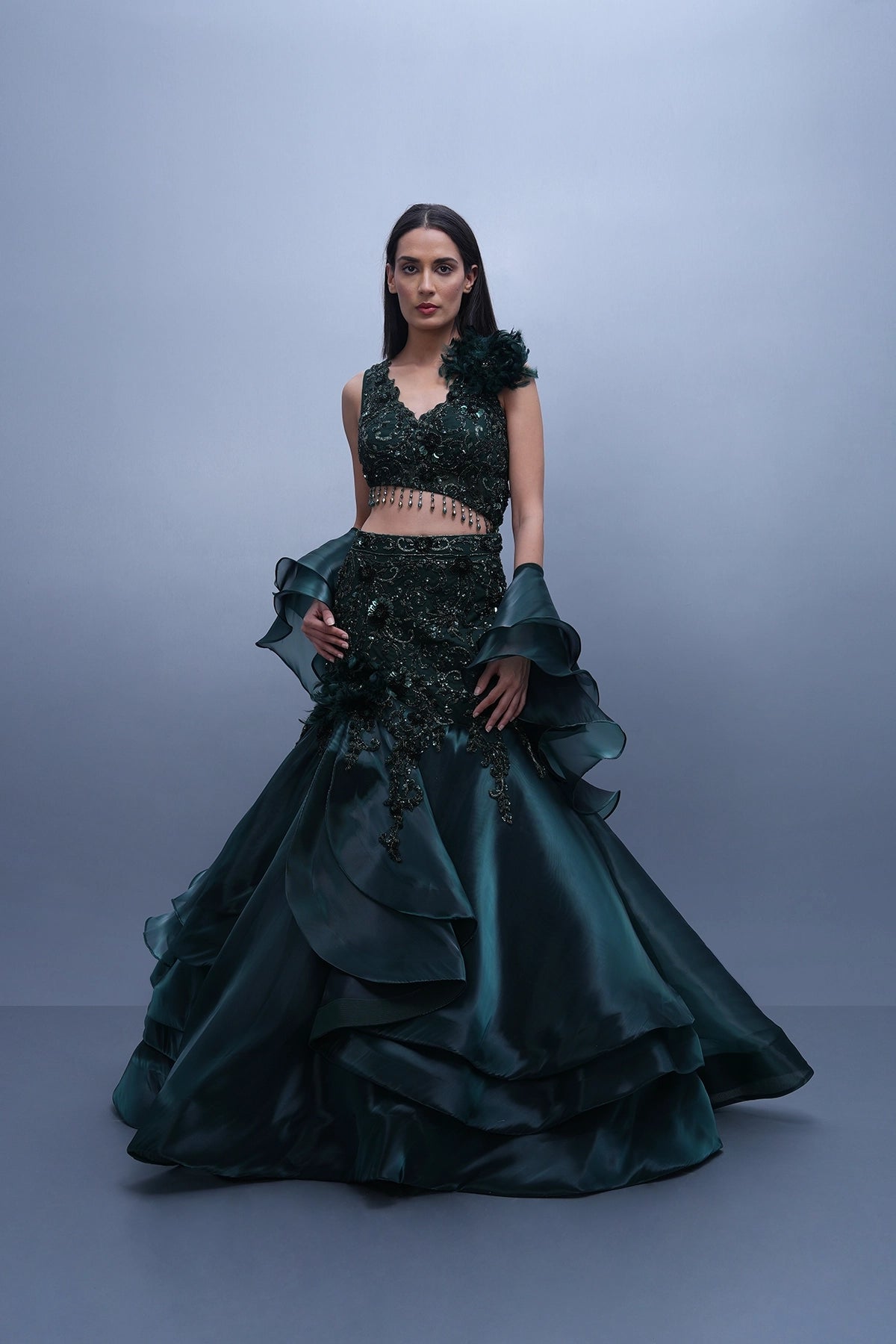 Bottle green fishcut lehenga with assymetric hem top and ruffle dupatta set