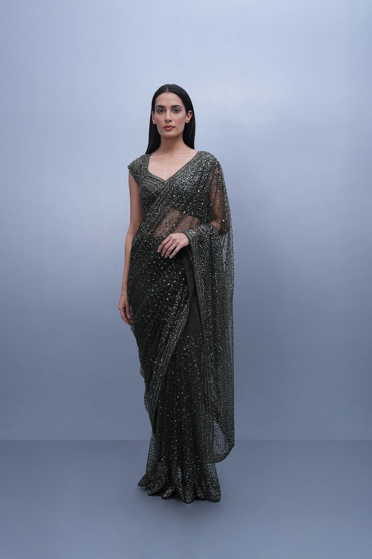 Dark olive green embroidered saree in net and blouse set