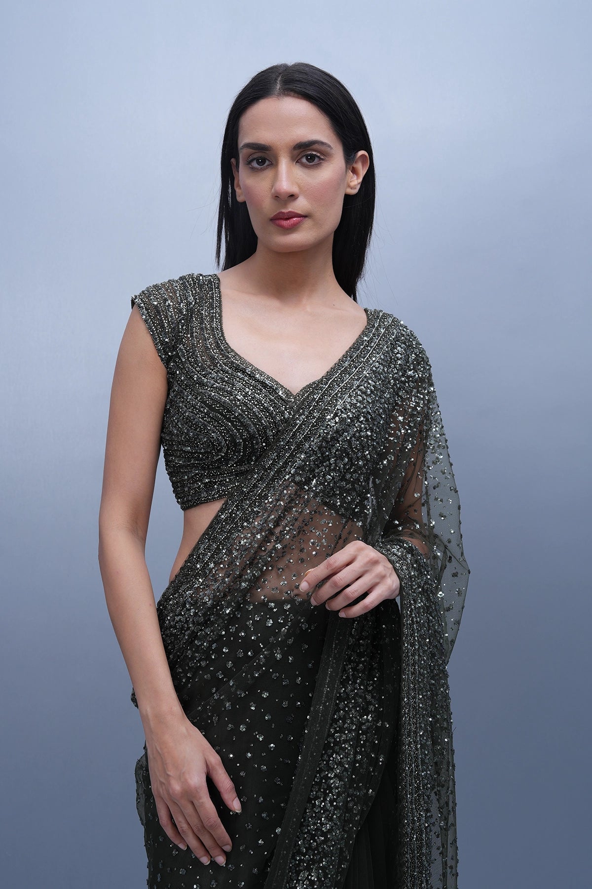 Dark olive green embroidered saree in net and blouse set