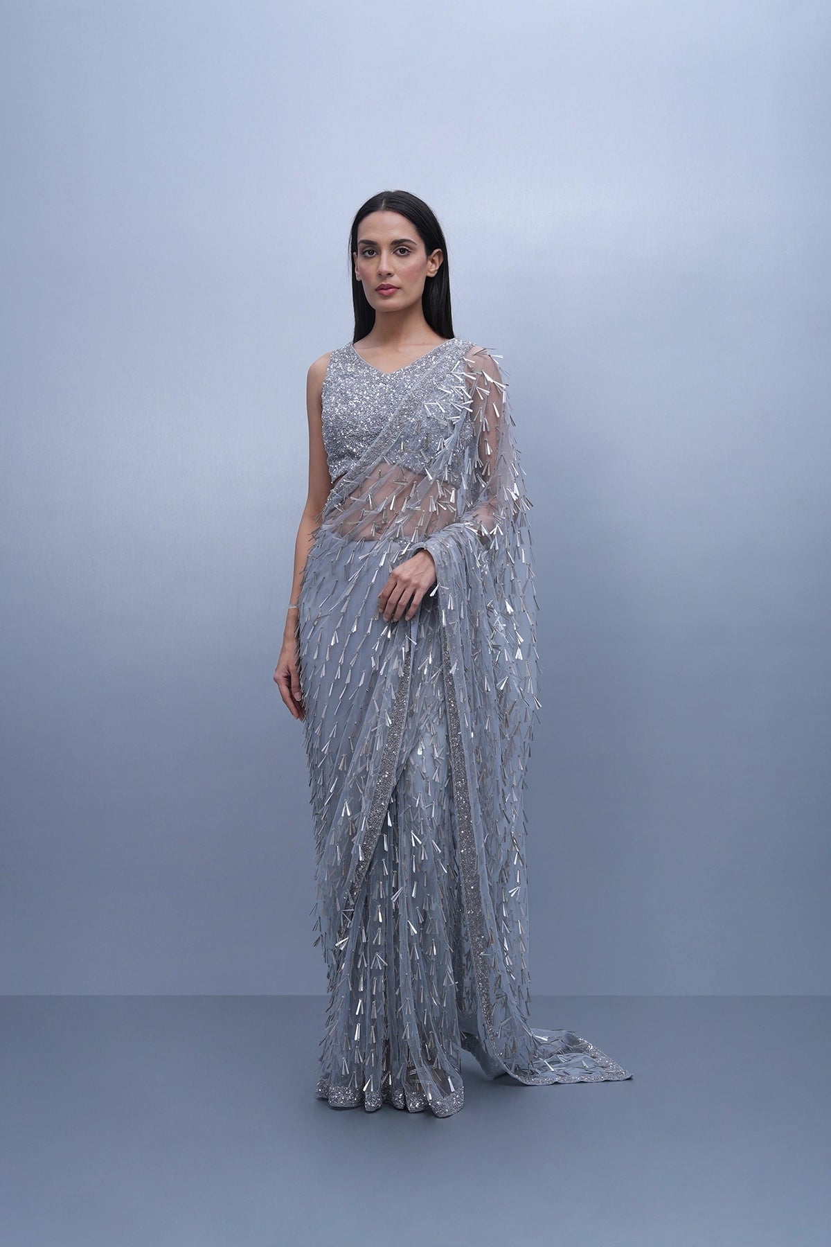Ice grey fancy sequin saree in net and embroidered blouse set