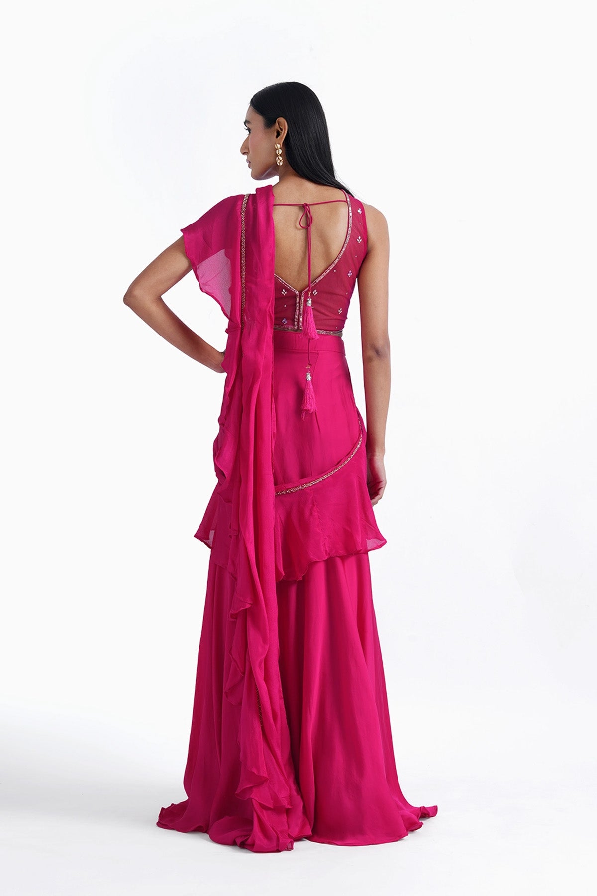 Hot pink fishcut saree with ruffle and corset top set