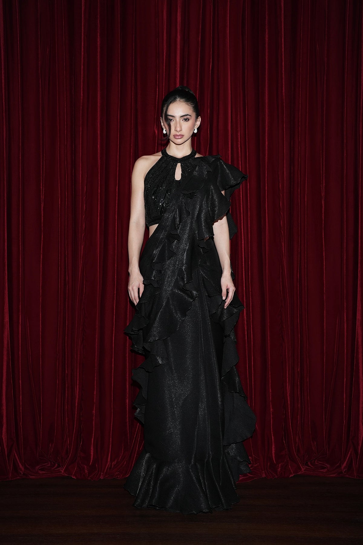 Black pre-draped ruffle saree in organza and halter neck blouse set