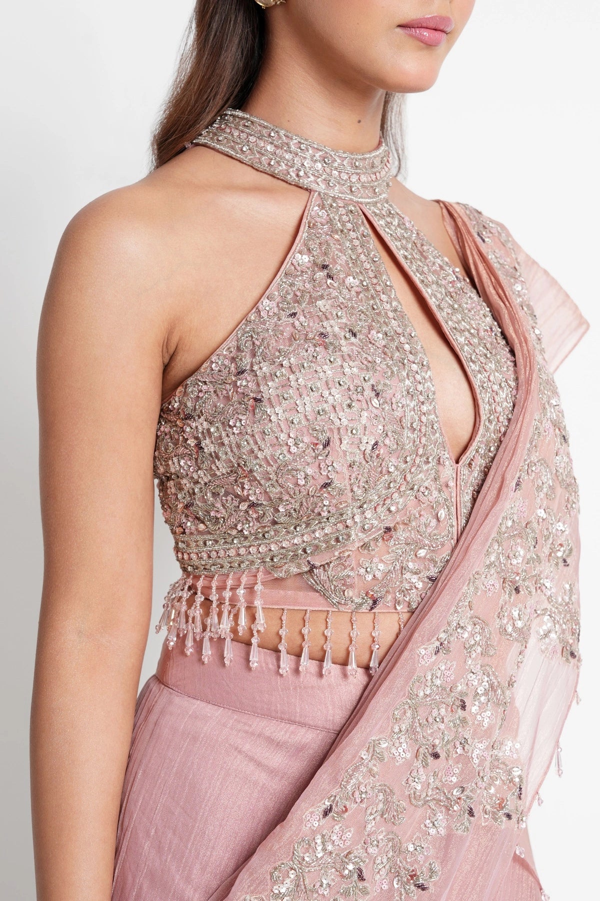 Antique Blush Pink Lehenga saree crafted in Tissue with halter neck blouse
