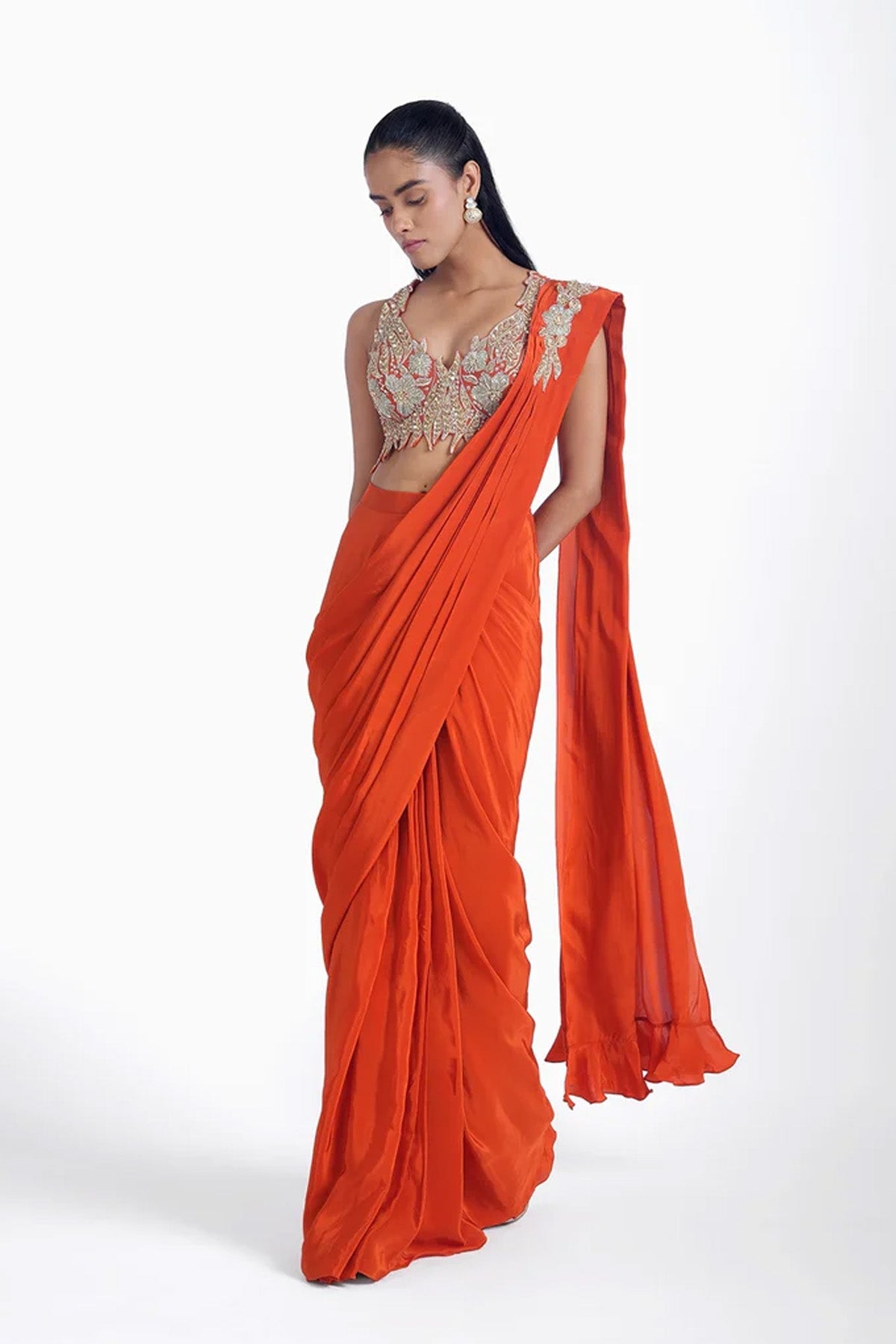 Orange pre-draped saree in crepe with katori style cutwork blouse set