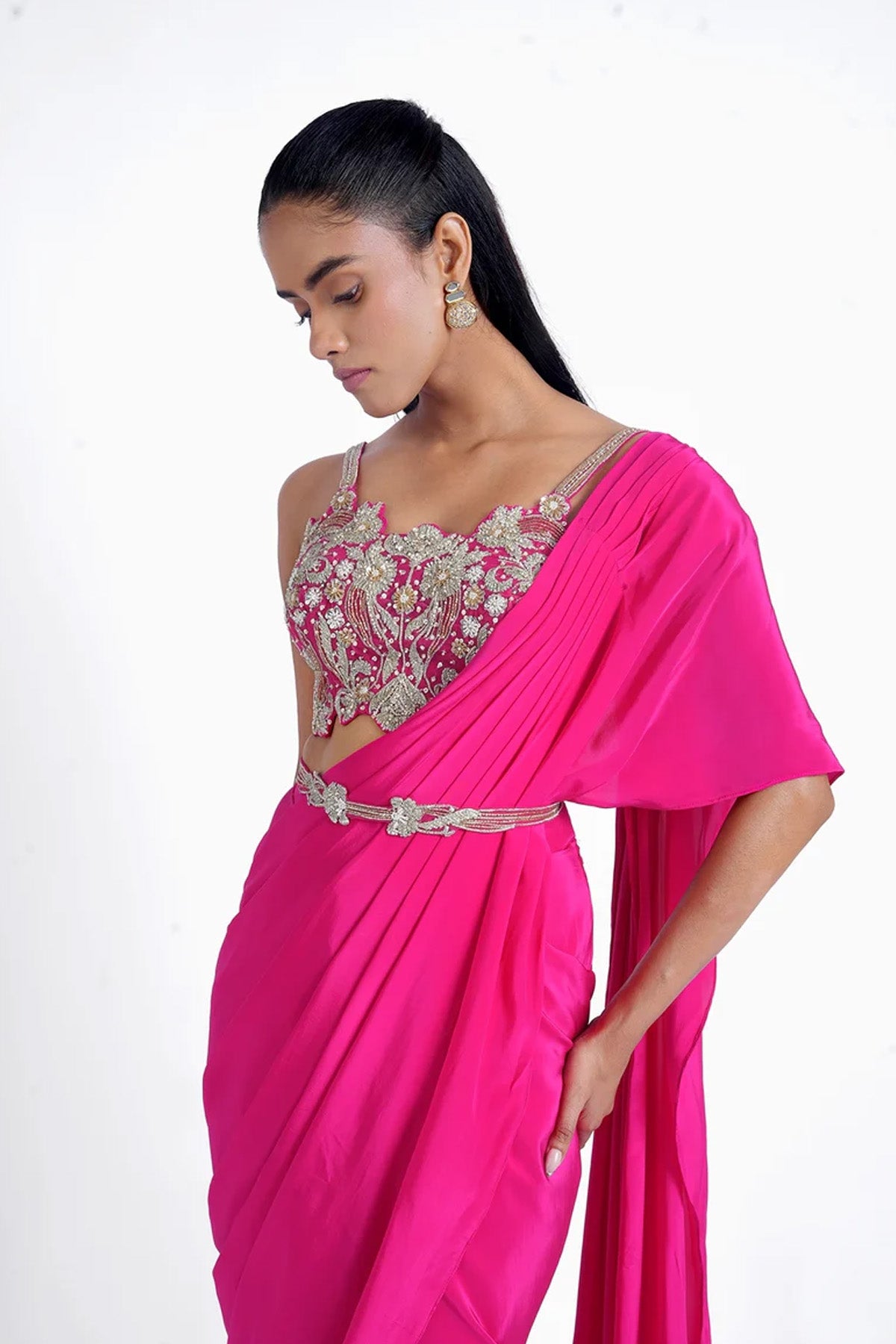 Rani pink pre-draped saree in crepe with spaghetti blouse and belt set