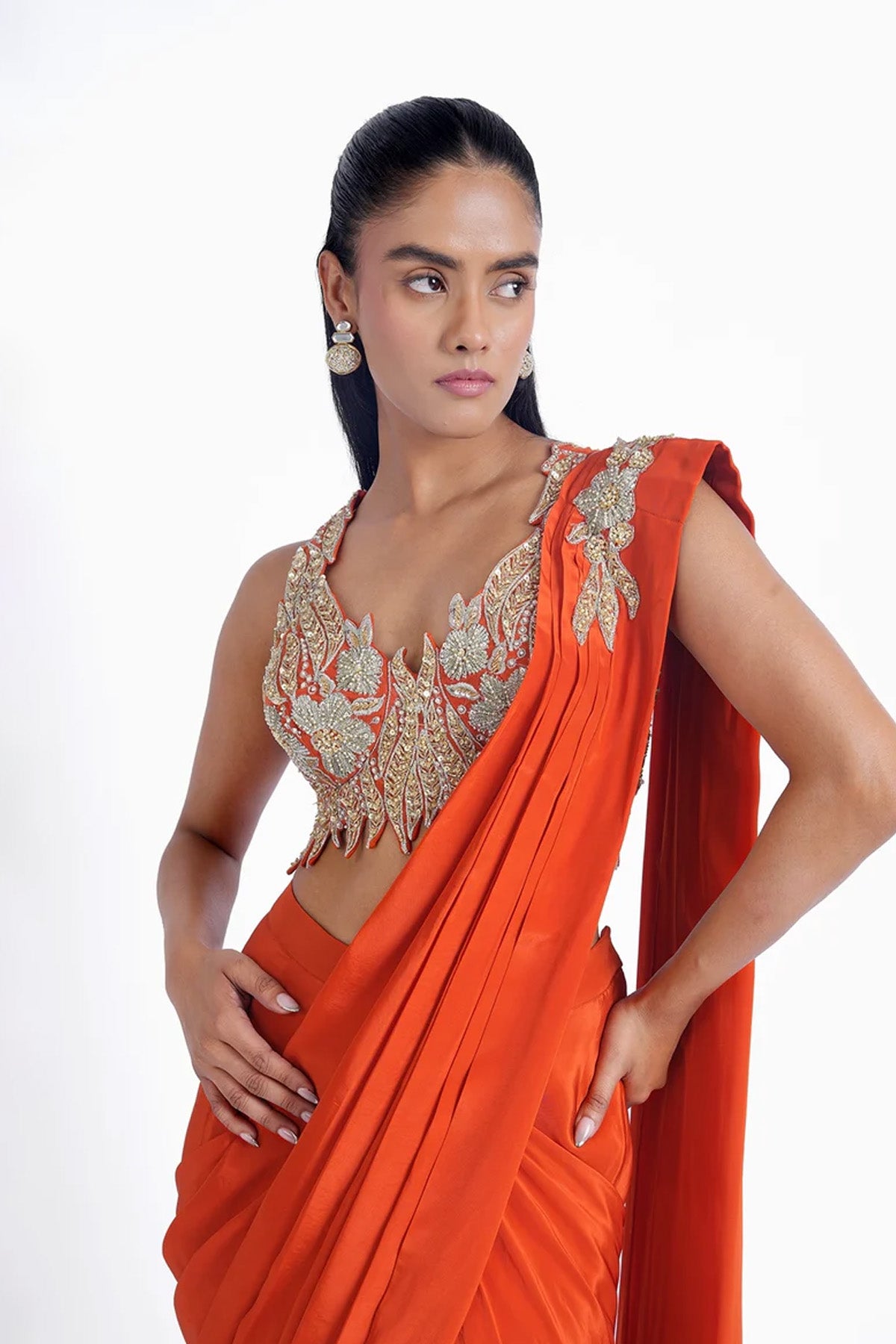 Orange pre-draped saree in crepe with katori style cutwork blouse set