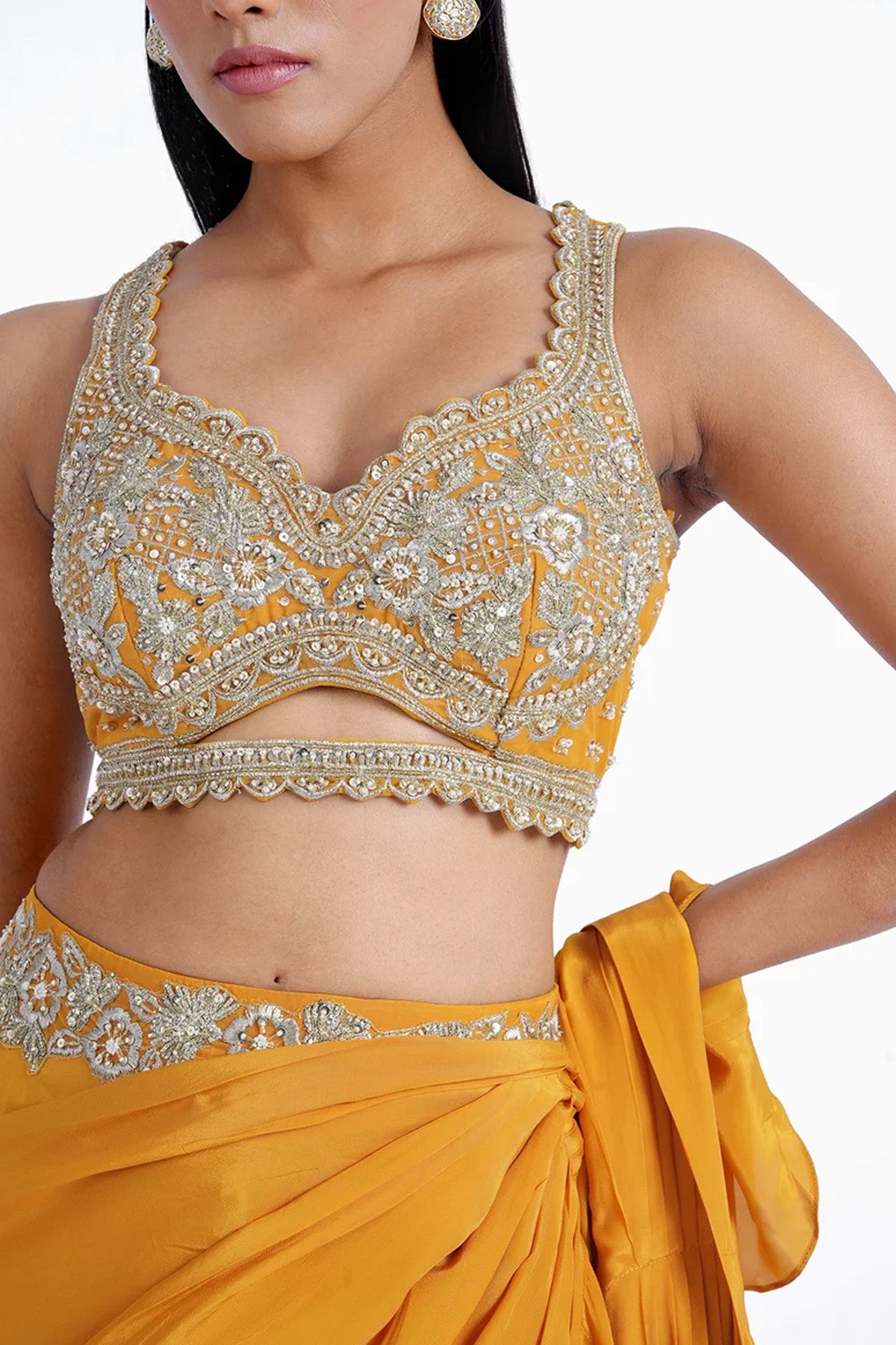 Chrome yellow ruffle pre-draped saree in crepe with hand embroidered blouse set