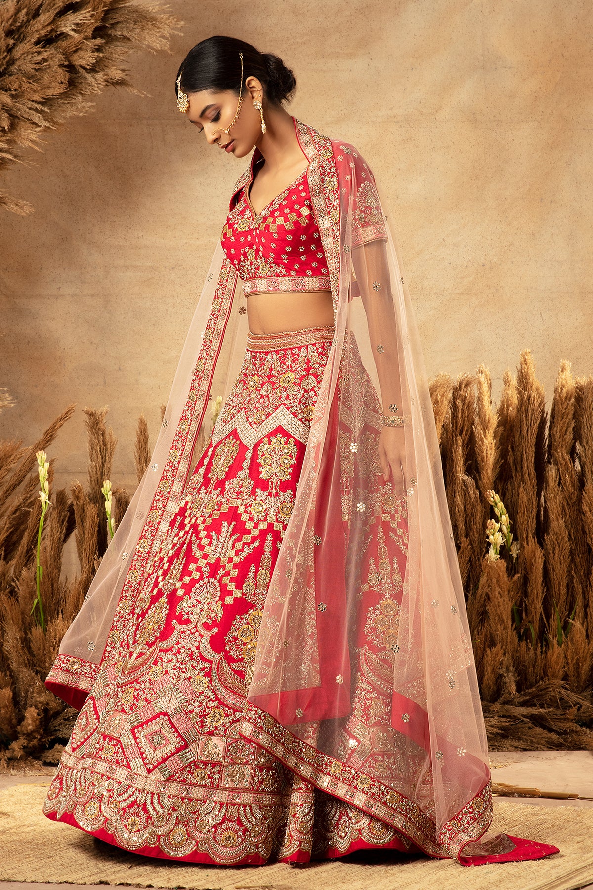 Panihari--Cherry Red Hand Embroidered Bridal Lehenga Set in Raw Silk