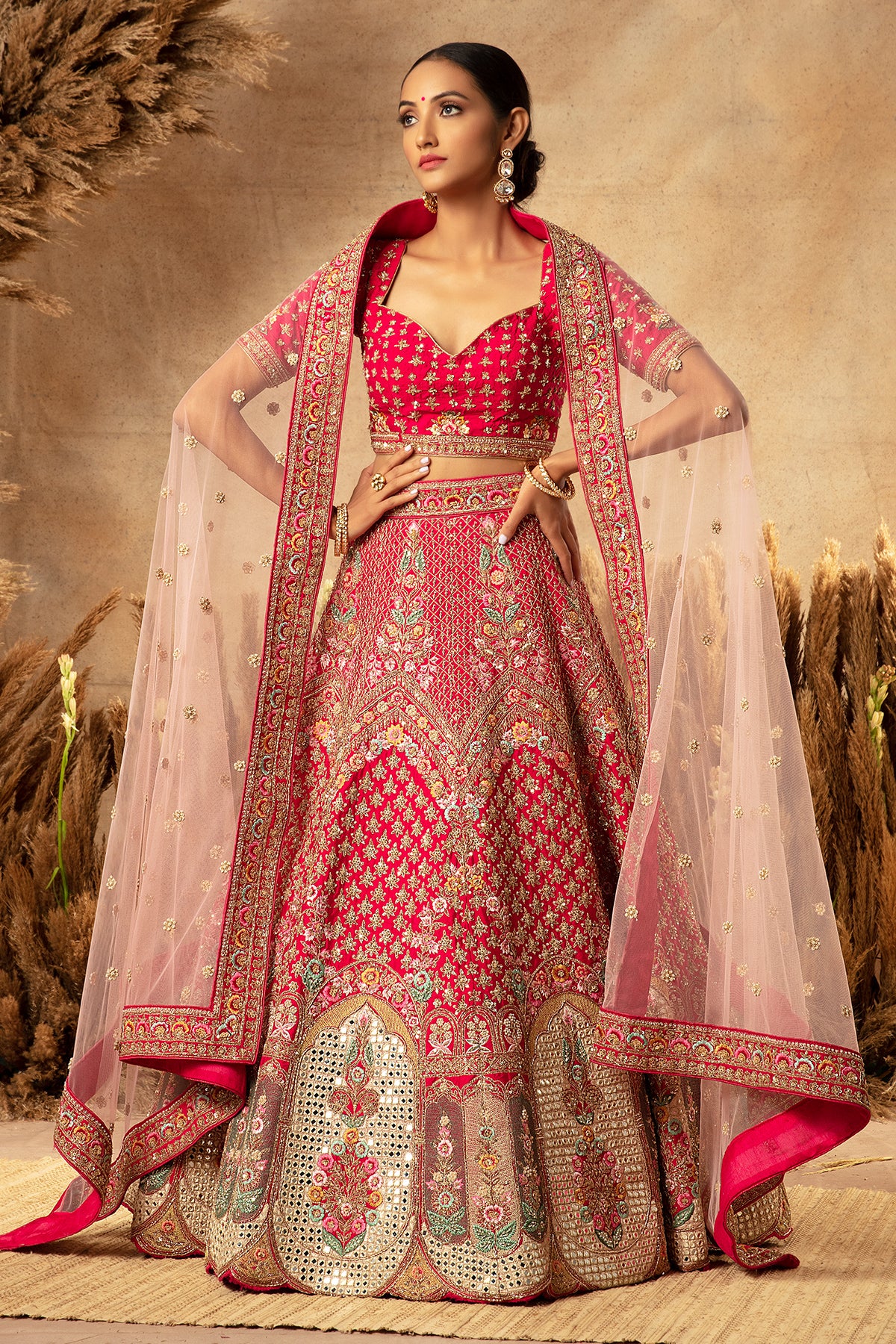 Panihari--Pink Bridal Lehenga in Raw Silk With Hand Embroidery and Heavy Morror Work Border