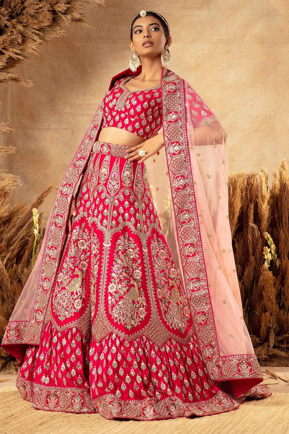 Panihari--Rani Pink Embroidered Rajwadi Bridal Lehenga Set in Raw Silk