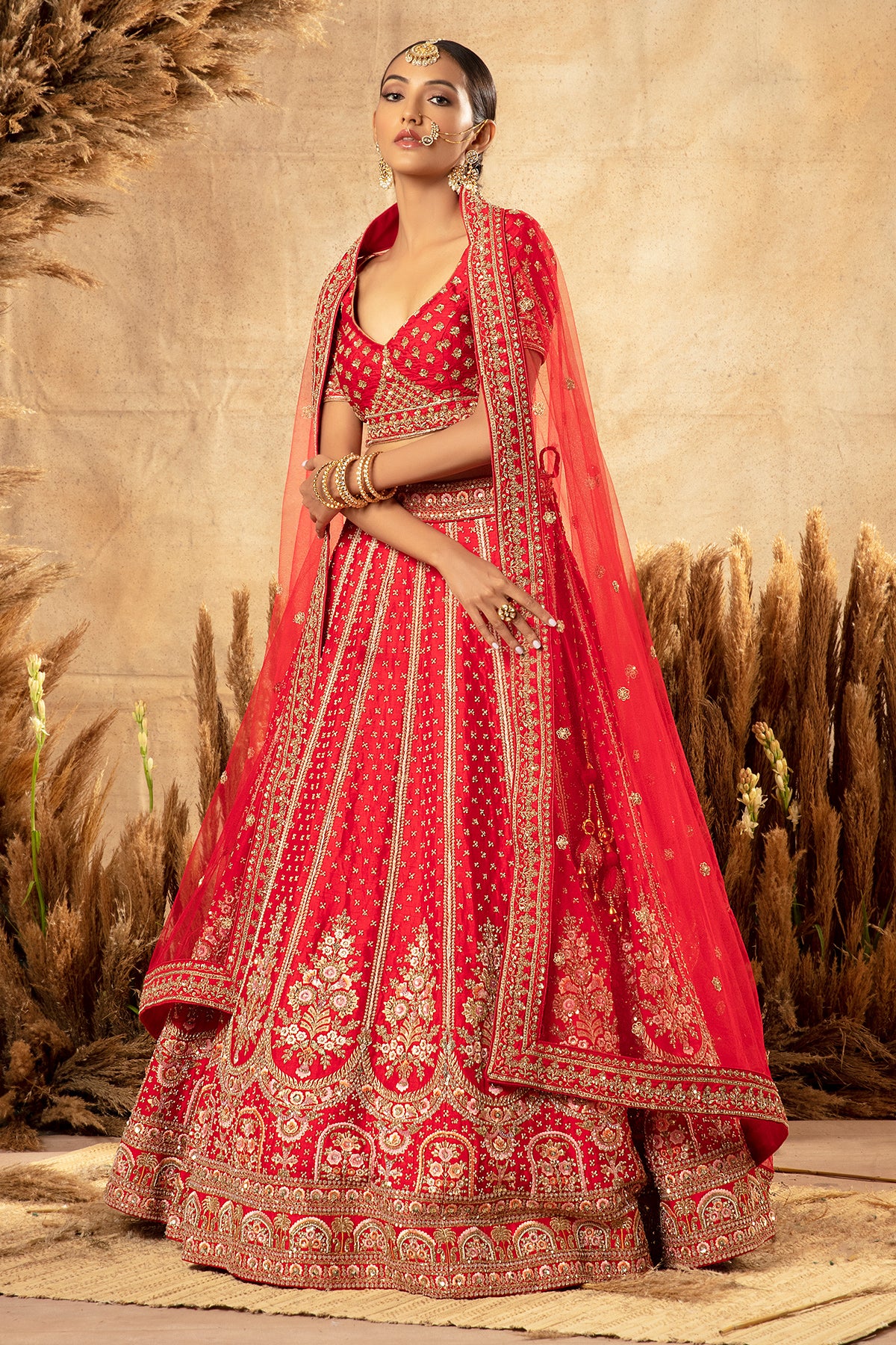 Panihari-Chilly Red Embroidered Bridal Lehenga Set in Raw Silk
