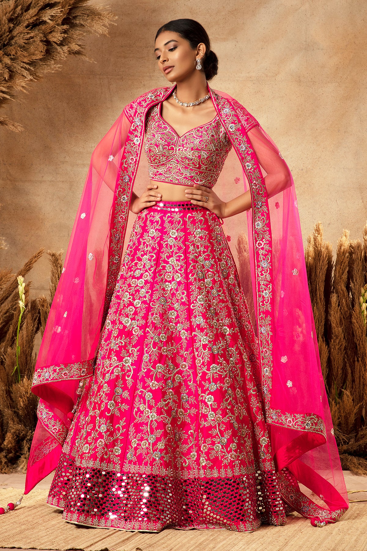 Panihari_--Fuchsia Pink Bridal Lehenga in Raw Silk With Heavy Embroidery and Mirror Work Border