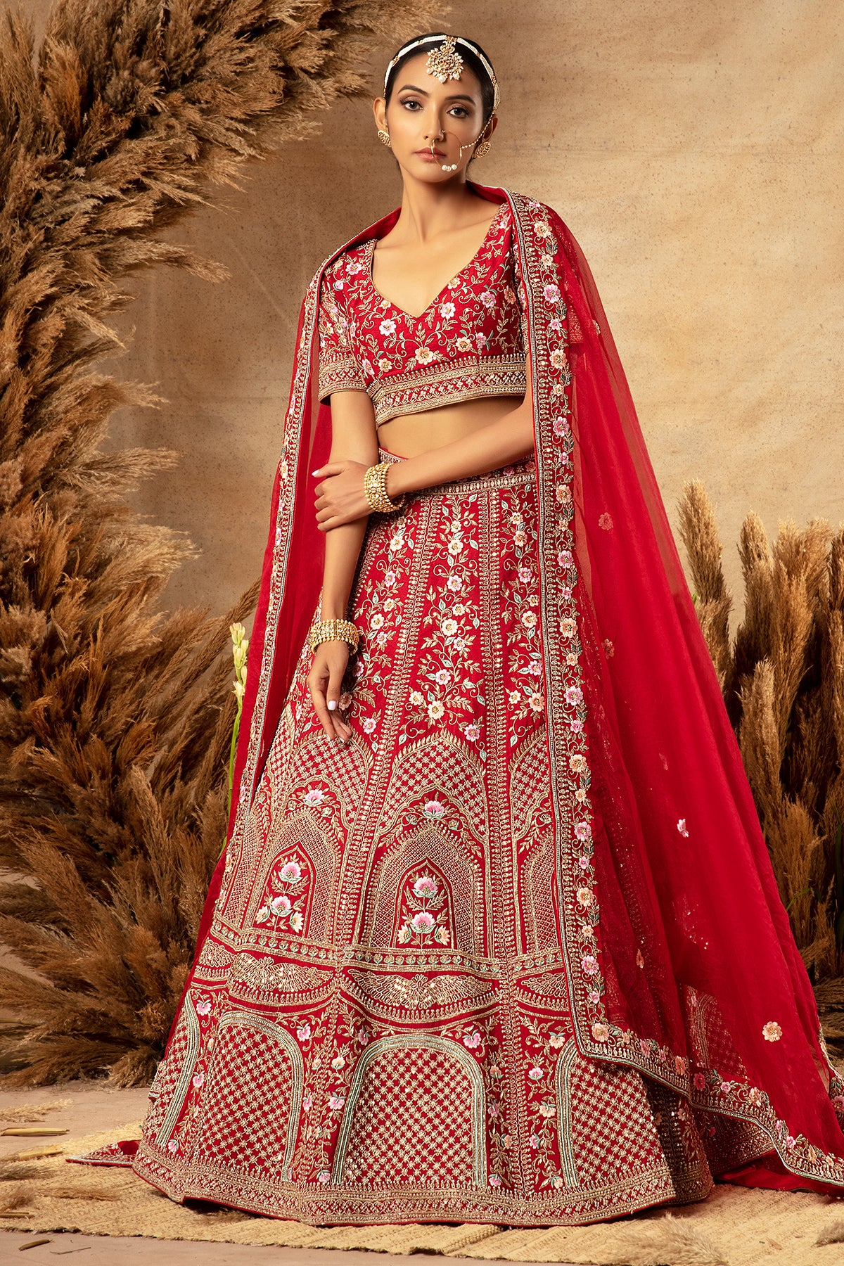 Panihari Crimson Red Hand Erbroidered Bridal Lehenga in Raw Silk