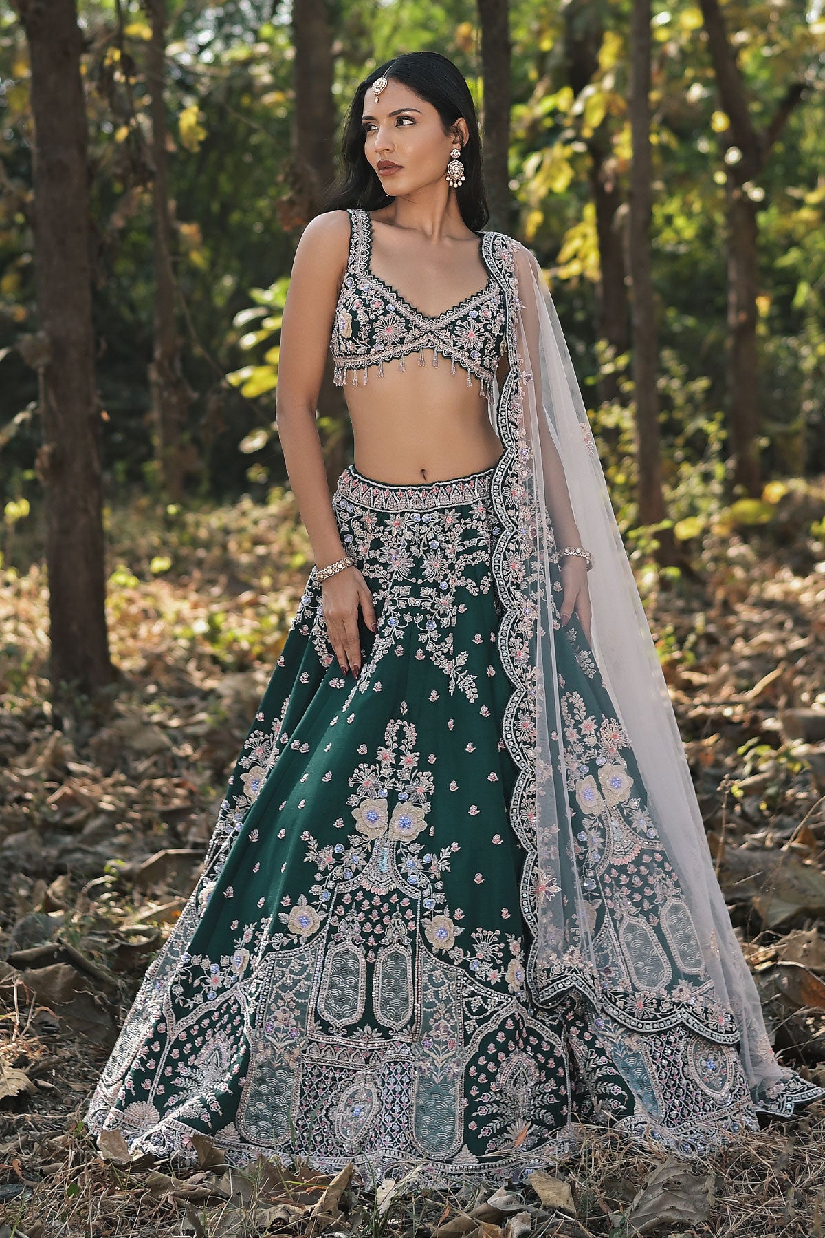 SERA VIII- dark emerald green lehenga set in raw silk