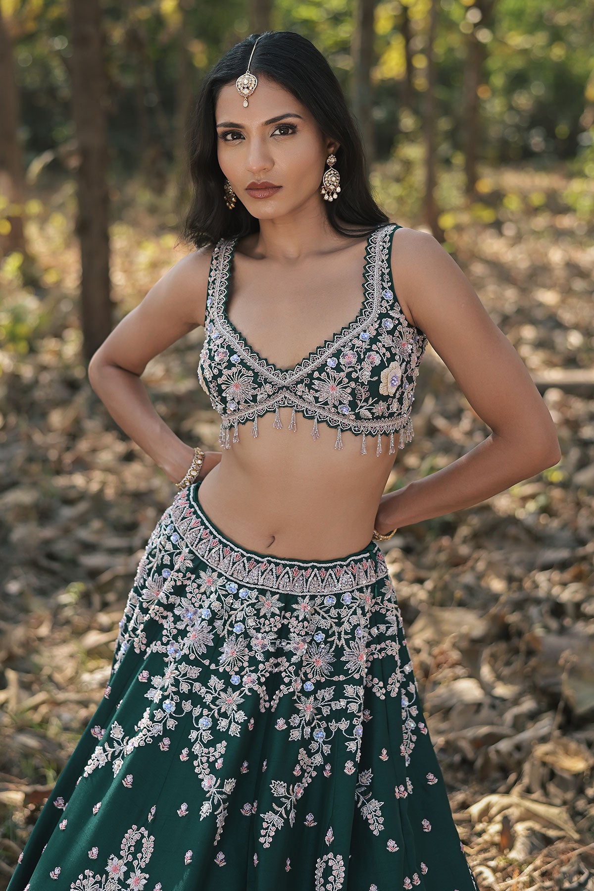 SERA VIII- dark emerald green lehenga set in raw silk
