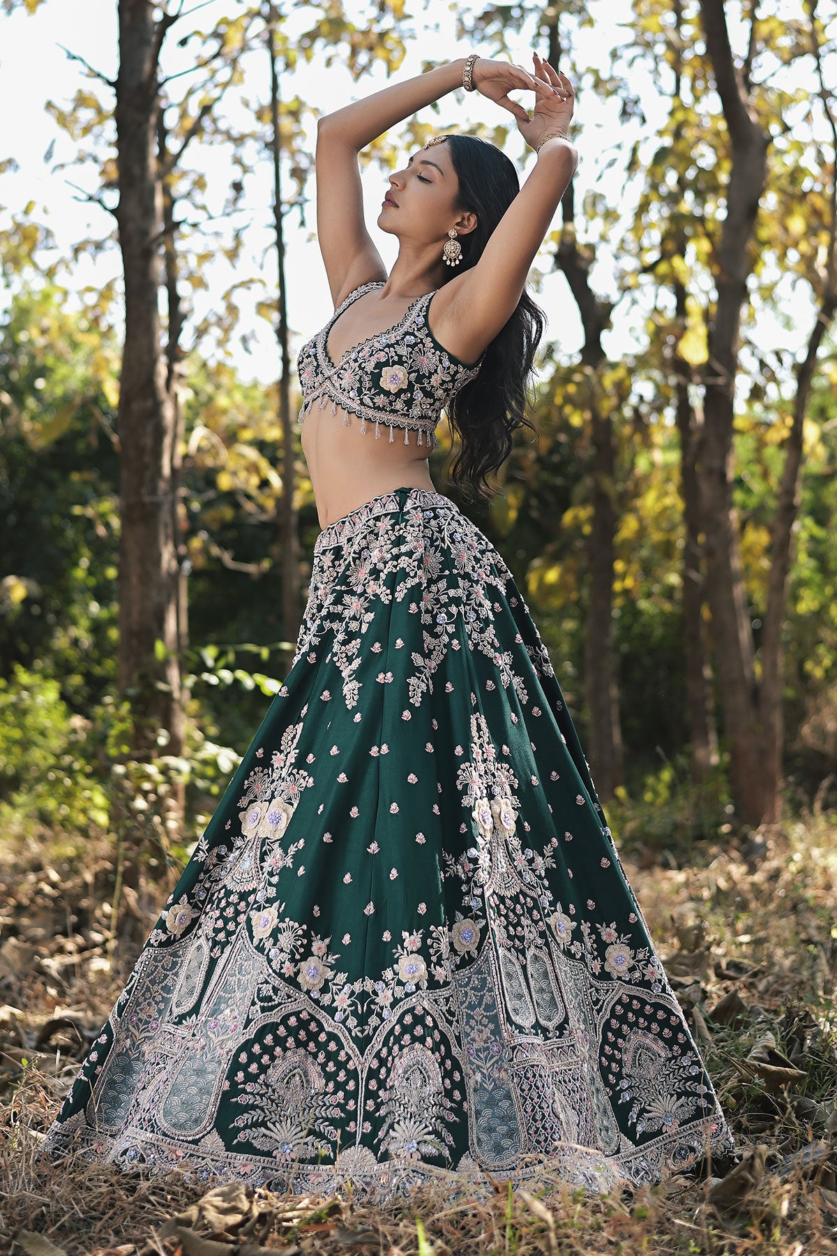 SERA VIII- dark emerald green lehenga set in raw silk