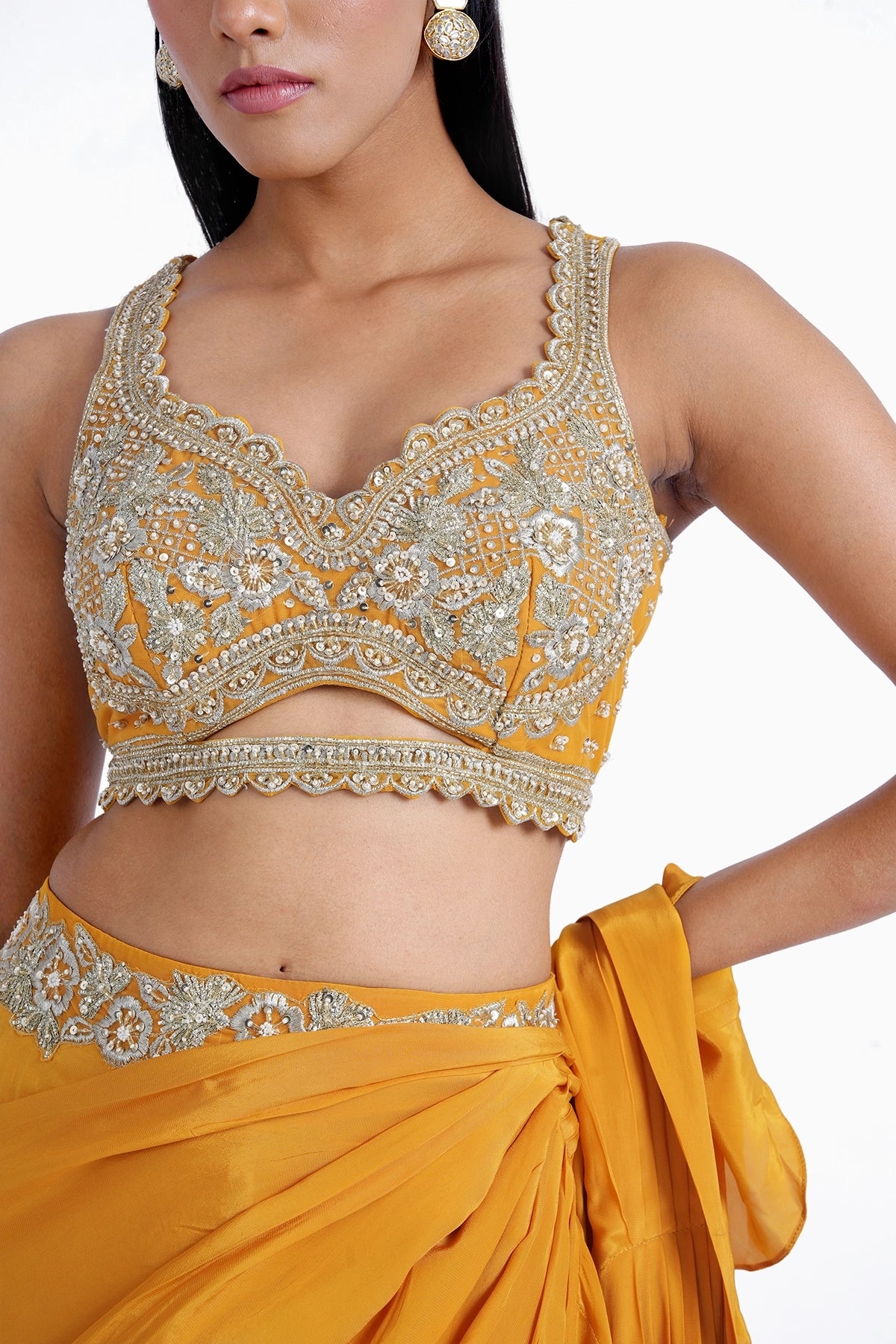 Chrome yellow ruffle pre-draped saree in crepe with hand embroidered blouse set