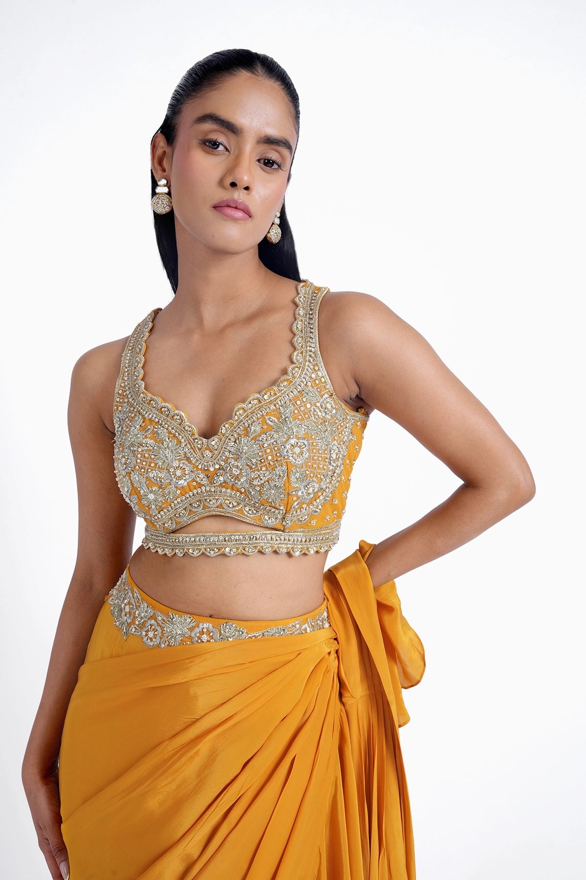 Chrome yellow ruffle pre-draped saree in crepe with hand embroidered blouse set