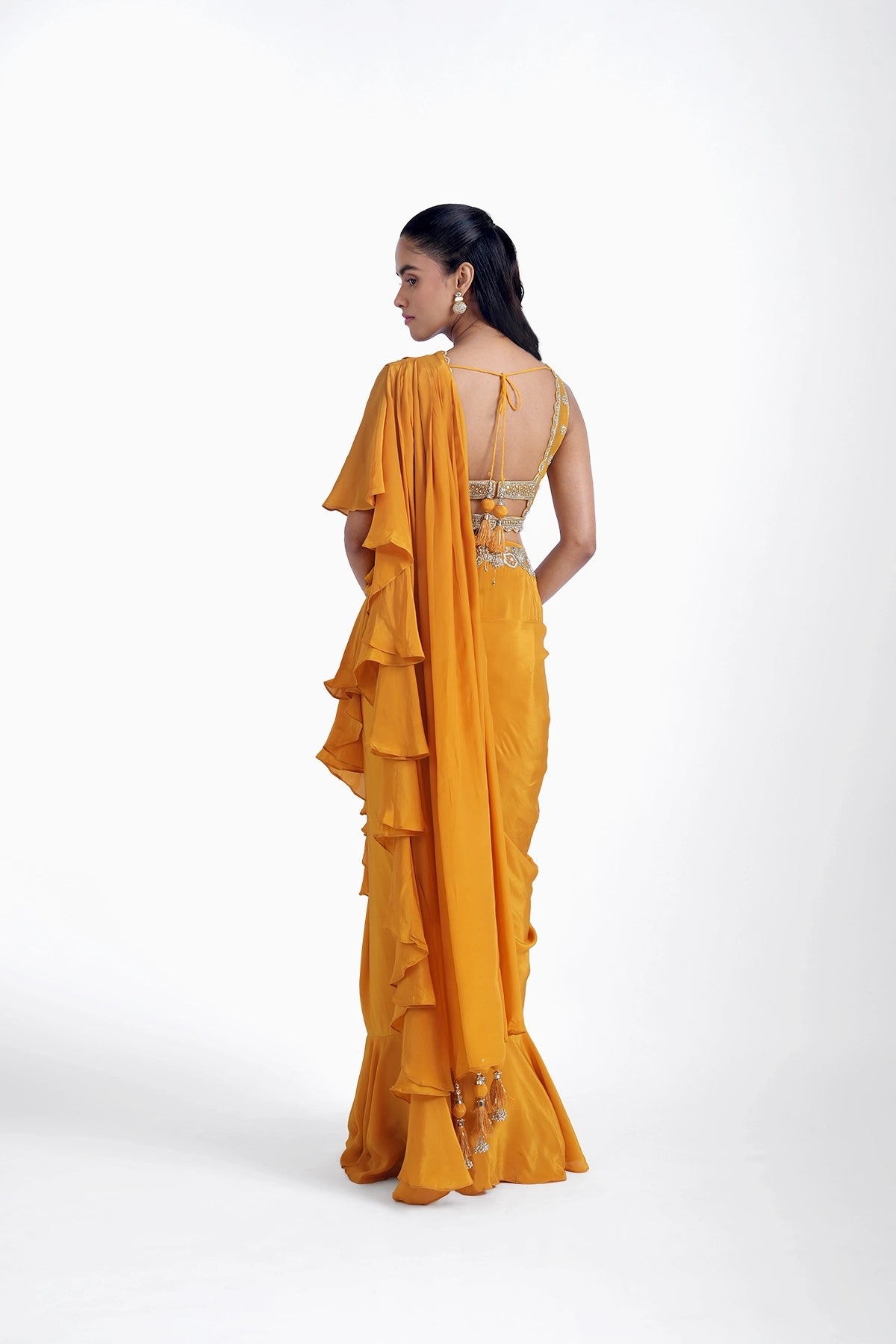 Chrome yellow ruffle pre-draped saree in crepe with hand embroidered blouse set