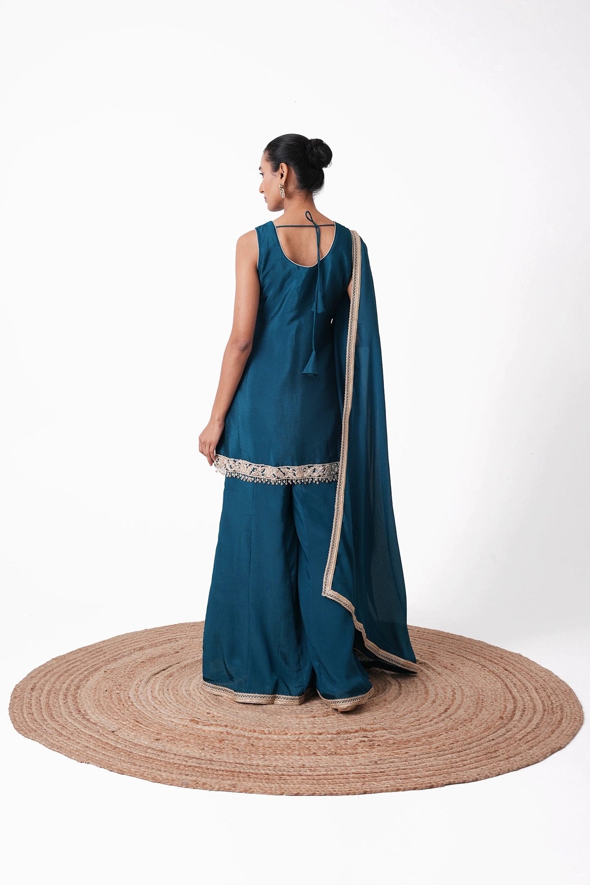 Peacock Blue Embroidered Suit Set In Chinnon Fabric
