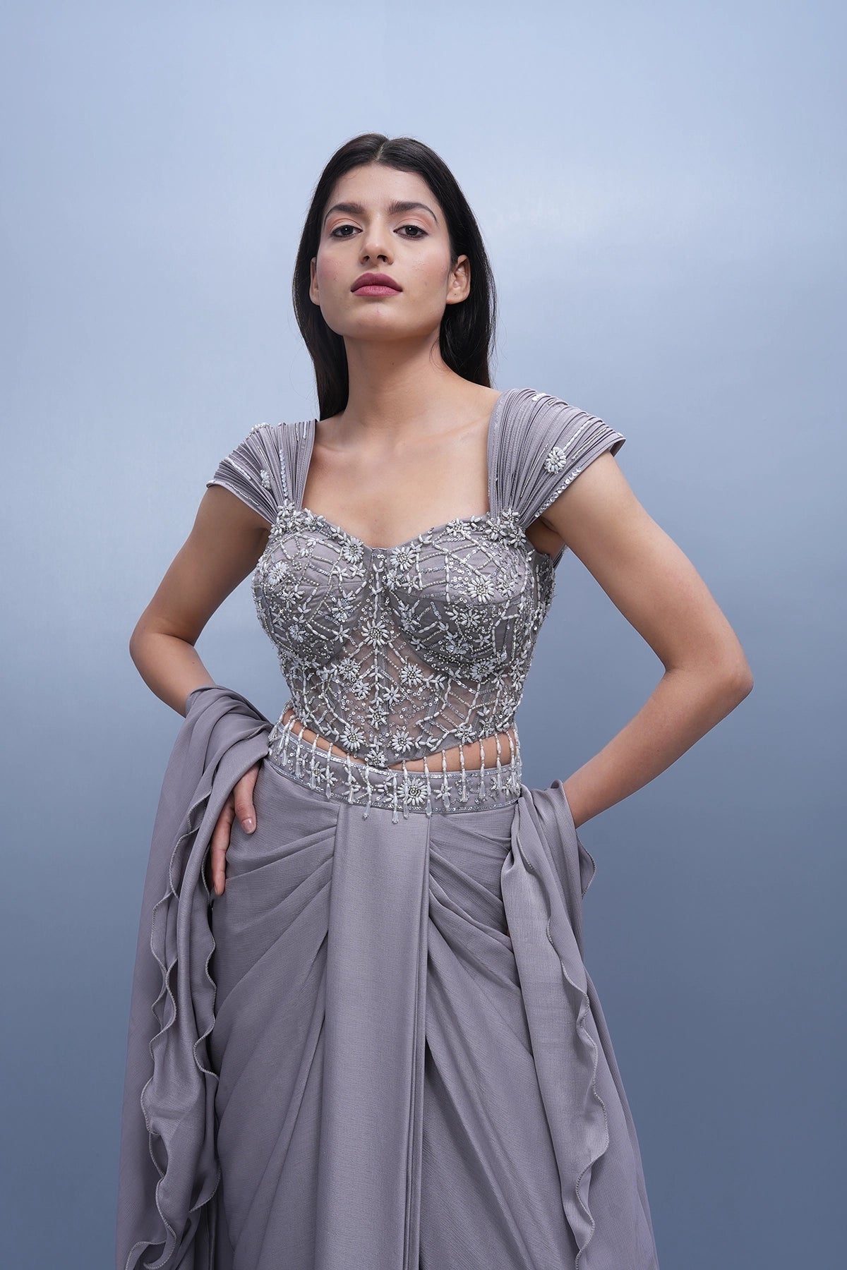 Lilac draped skirt set with embroidered wired blouse and ruffle dupatta