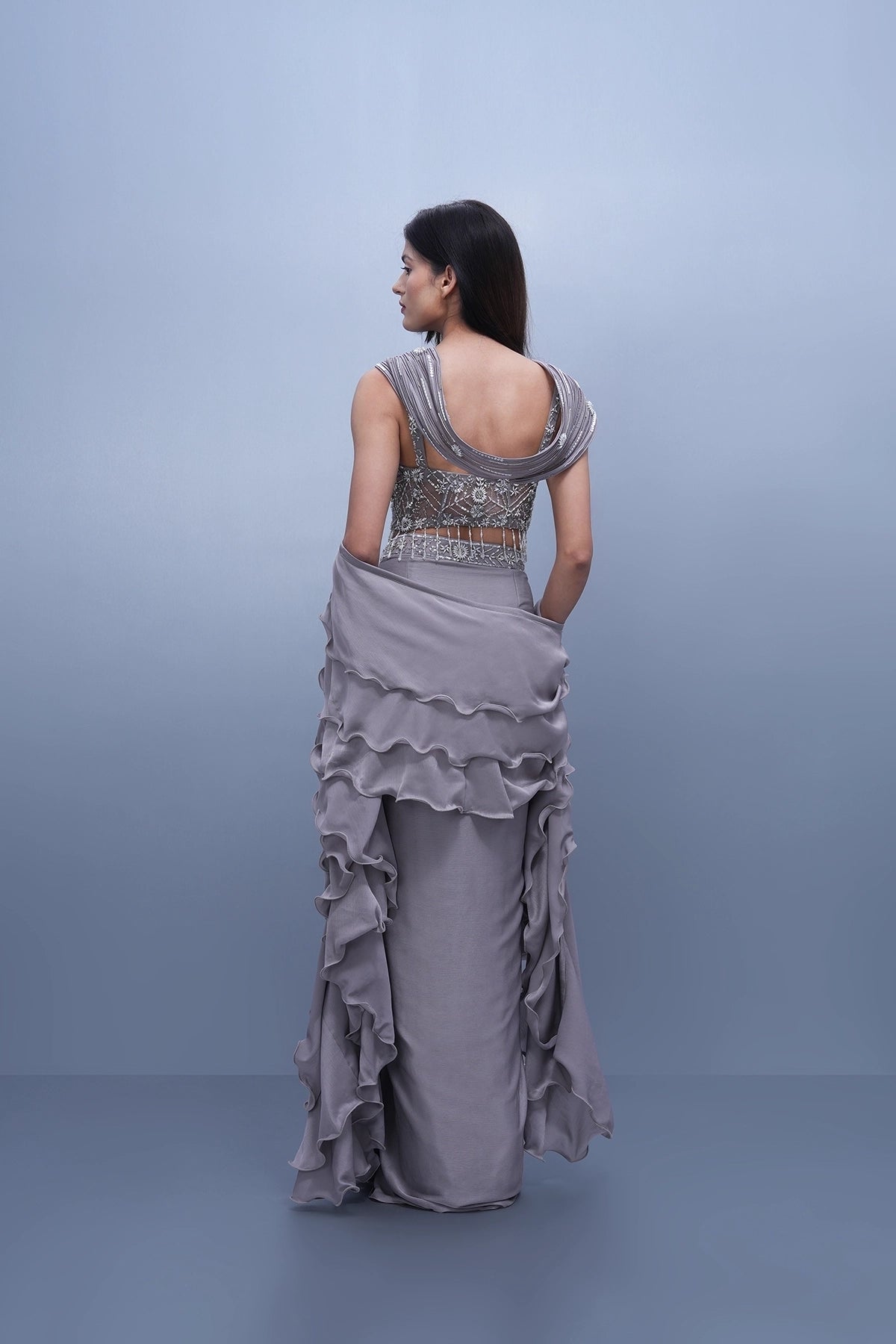 Lilac draped skirt set with embroidered wired blouse and ruffle dupatta