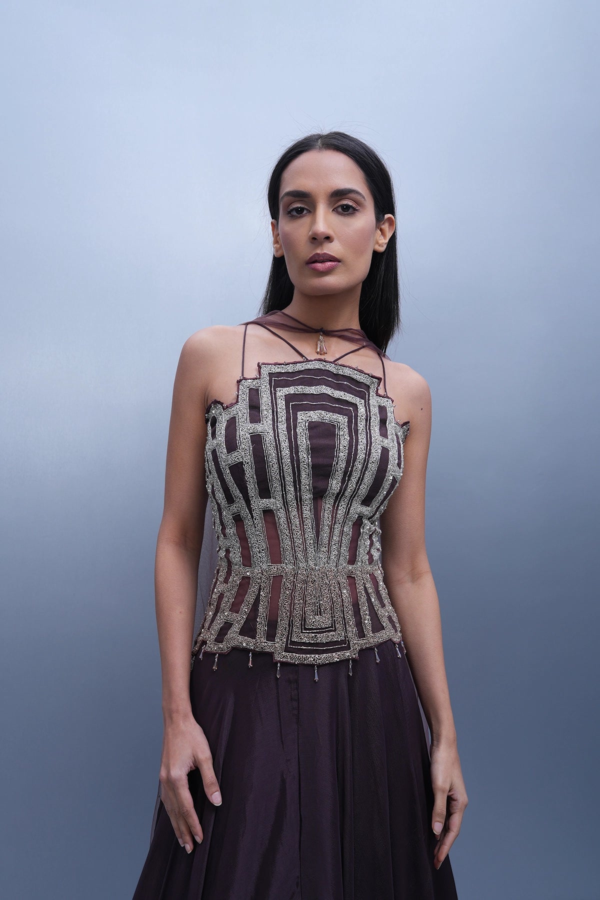 Dark mauve lehenga with a long corset top and choker dupatta