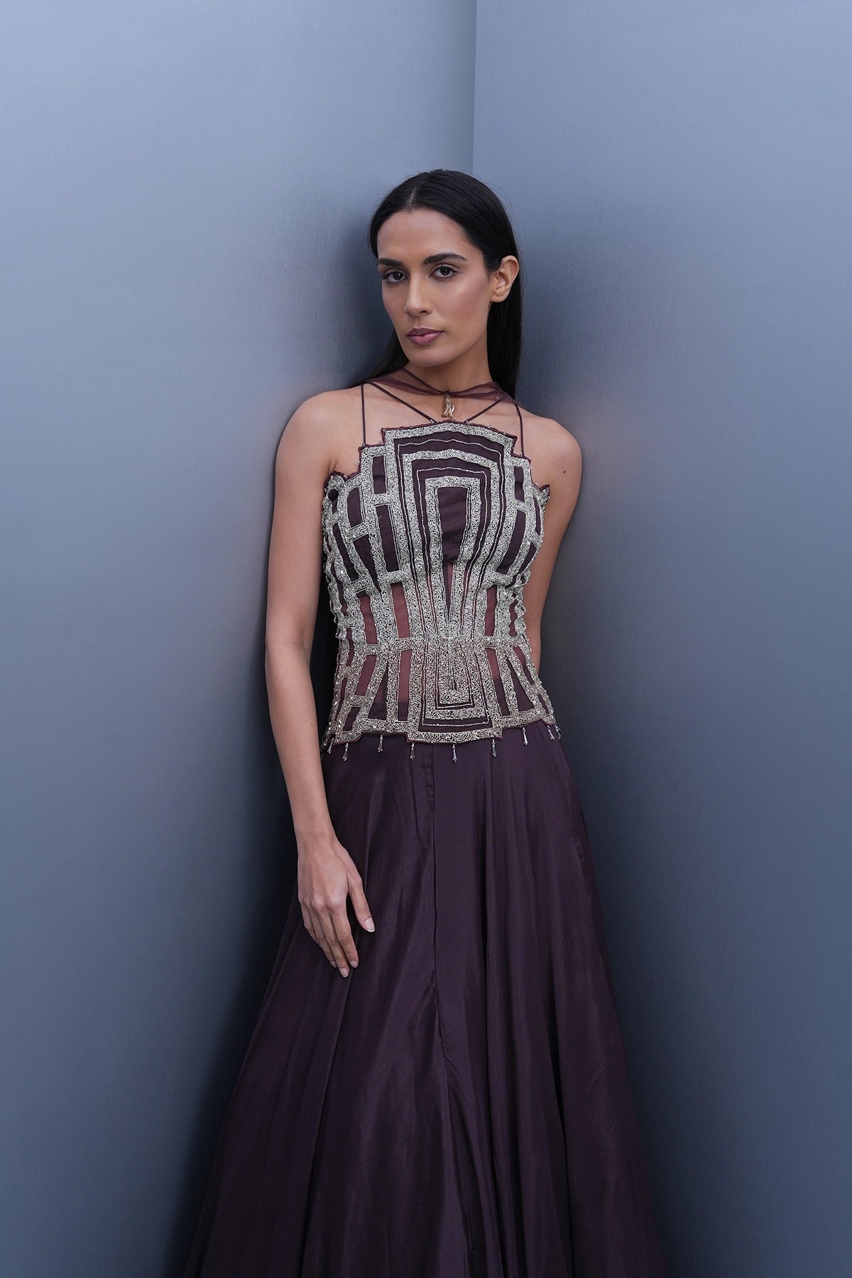 Dark mauve lehenga with a long corset top and choker dupatta