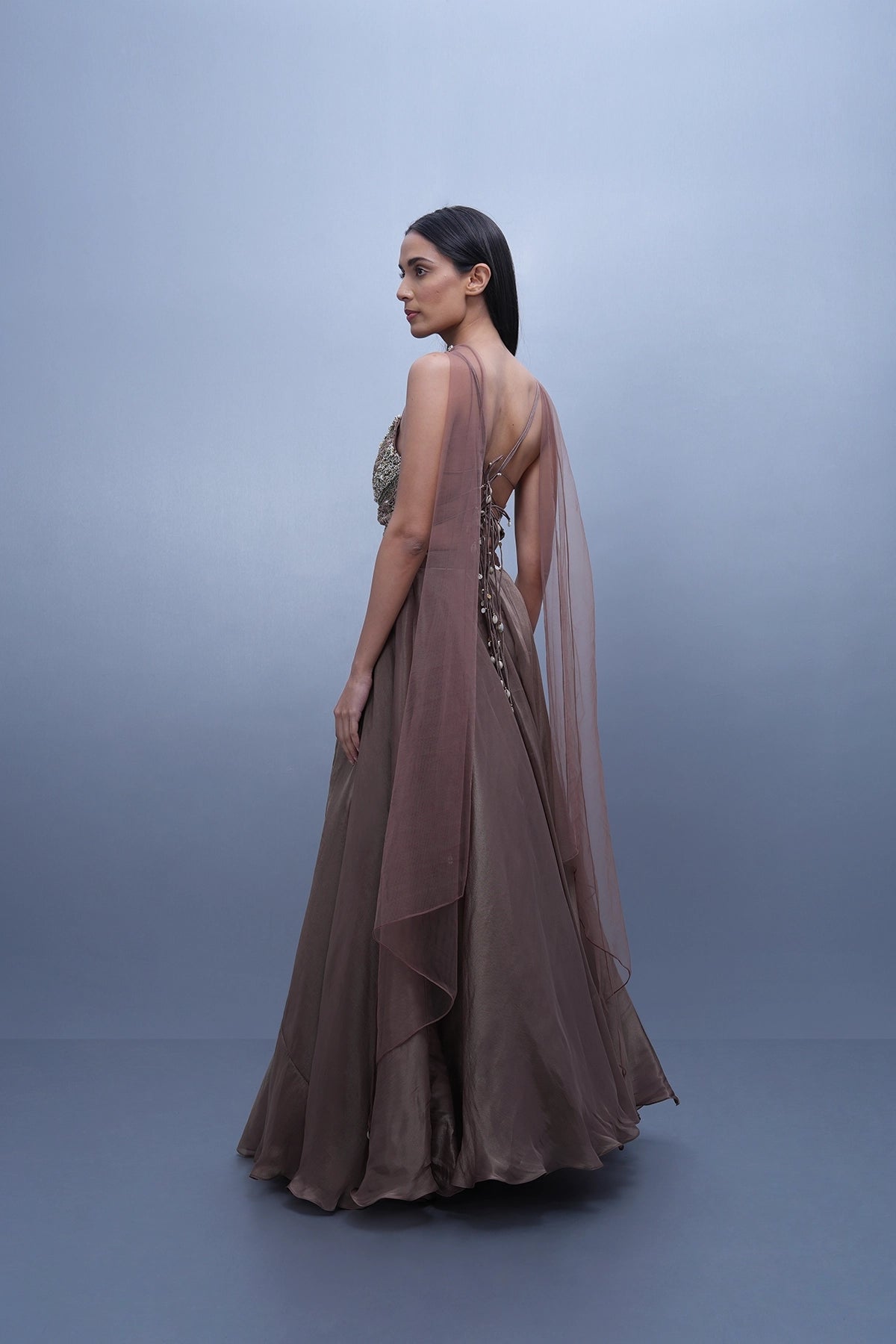 Brownish mauve lehenga in tissue with spaghetti blouse and choker dupatta