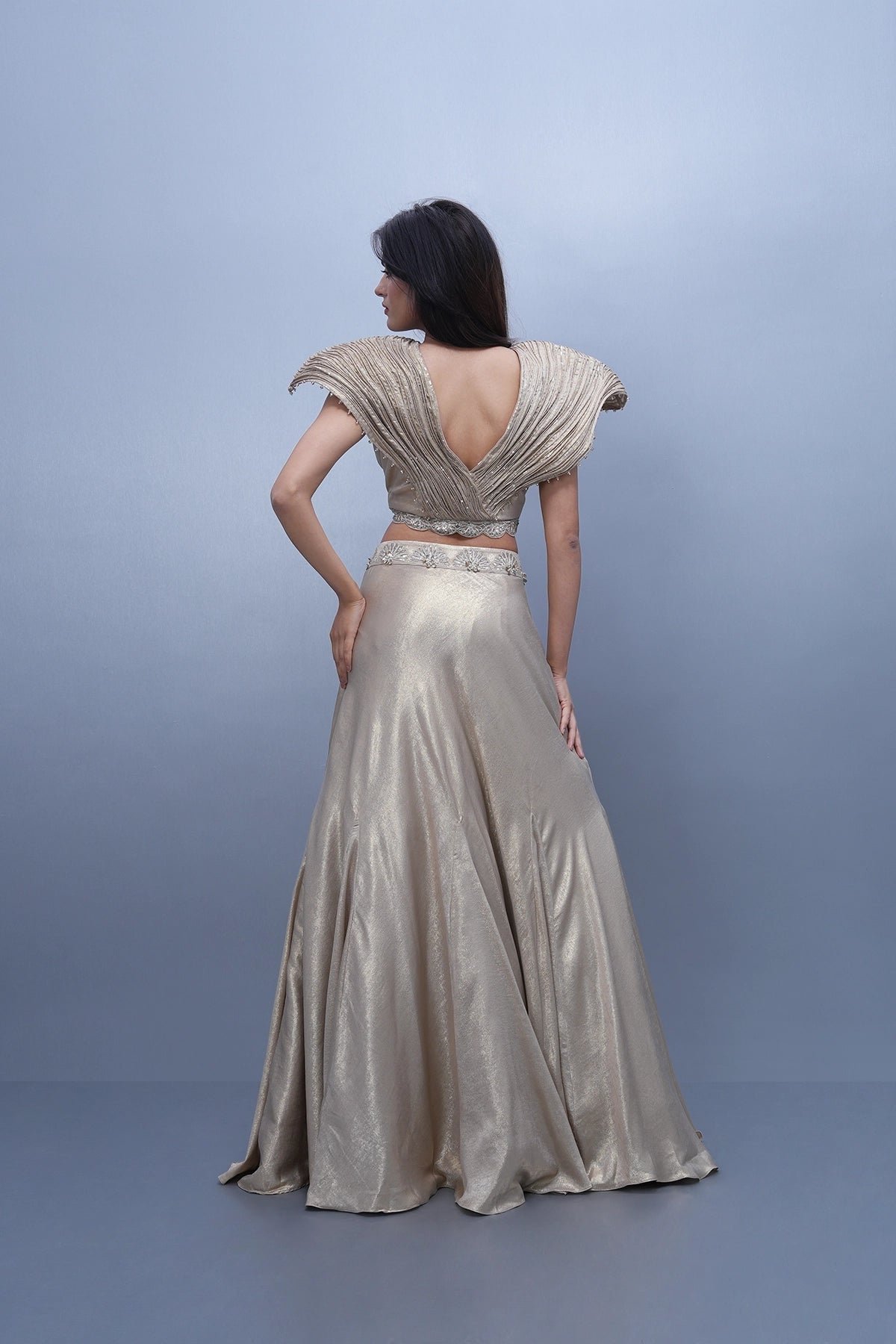 Ivory gold shine lehenga with dramatic wired blouse
