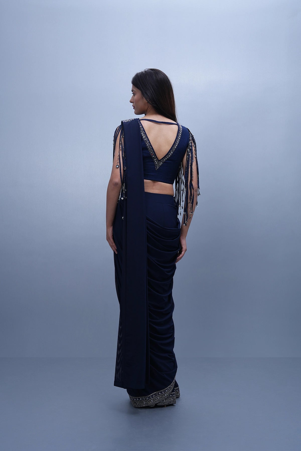 Navy blue pre-draped saree set with a blouse having fringes