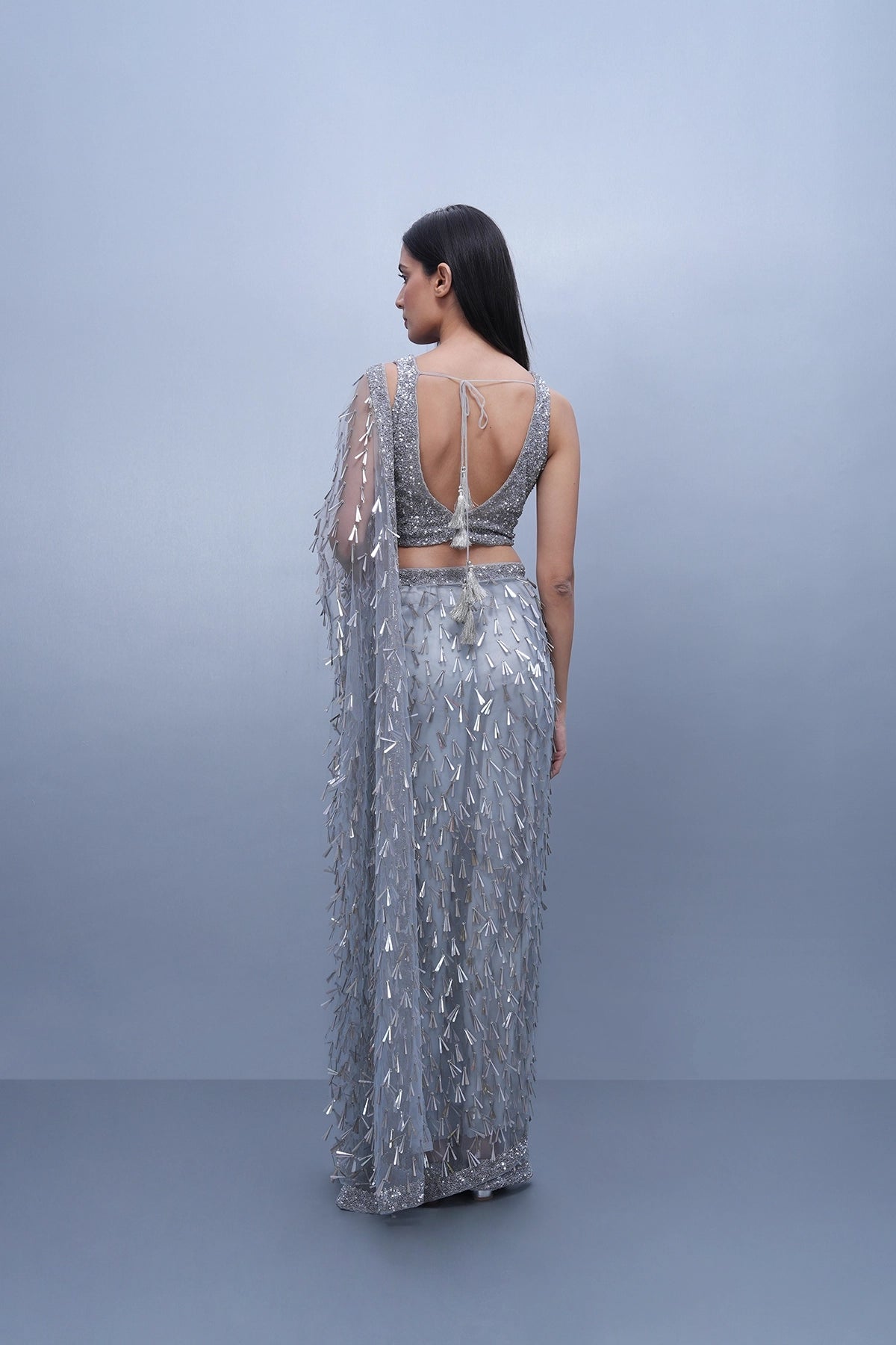 Ice grey fancy sequin saree in net and embroidered blouse set