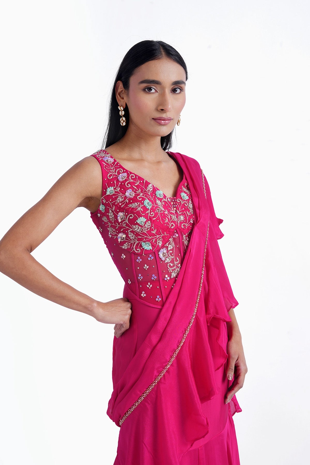 Hot pink fishcut saree with ruffle and corset top set