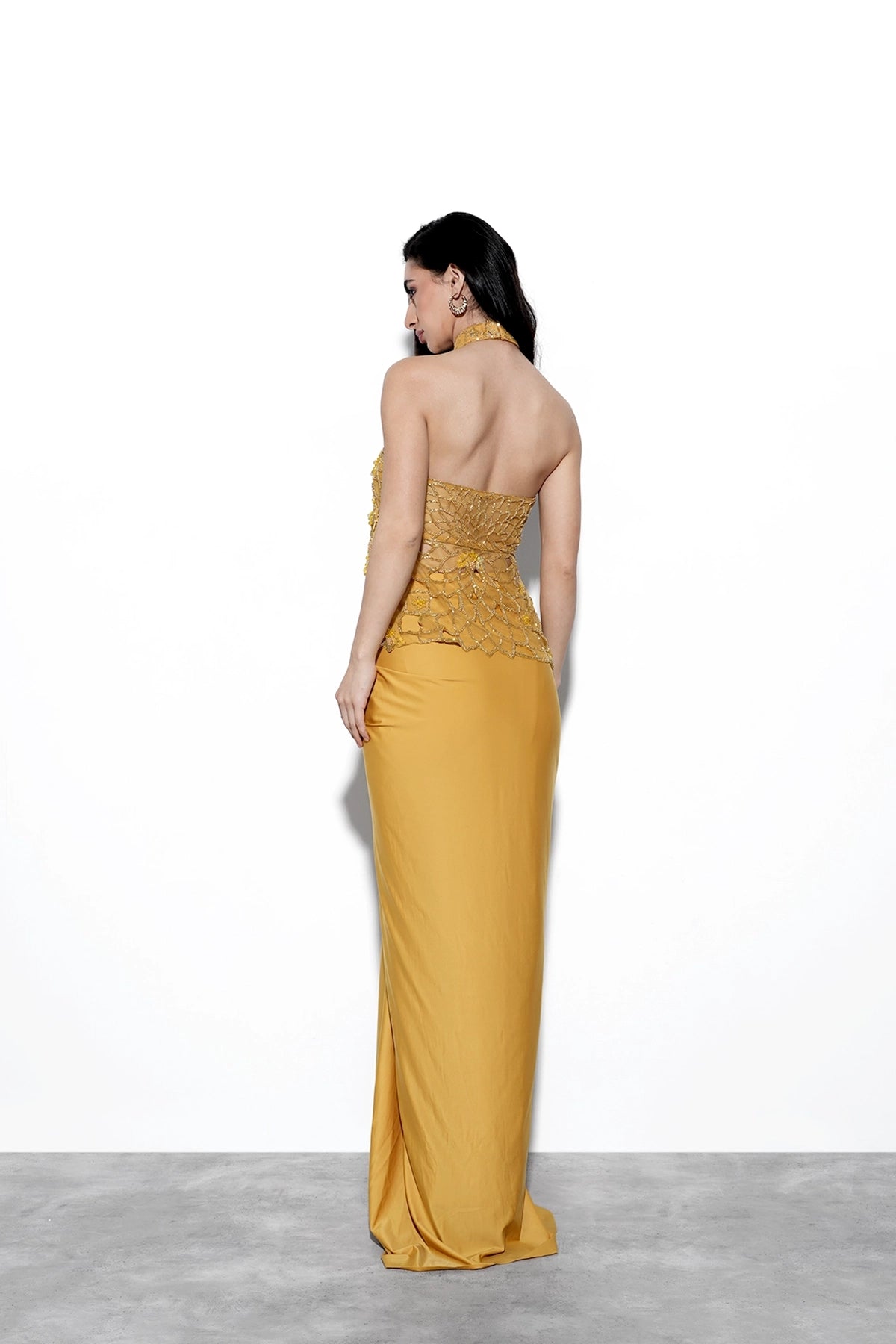 Chrome yellow halter neck cutwork top and draped skirt set