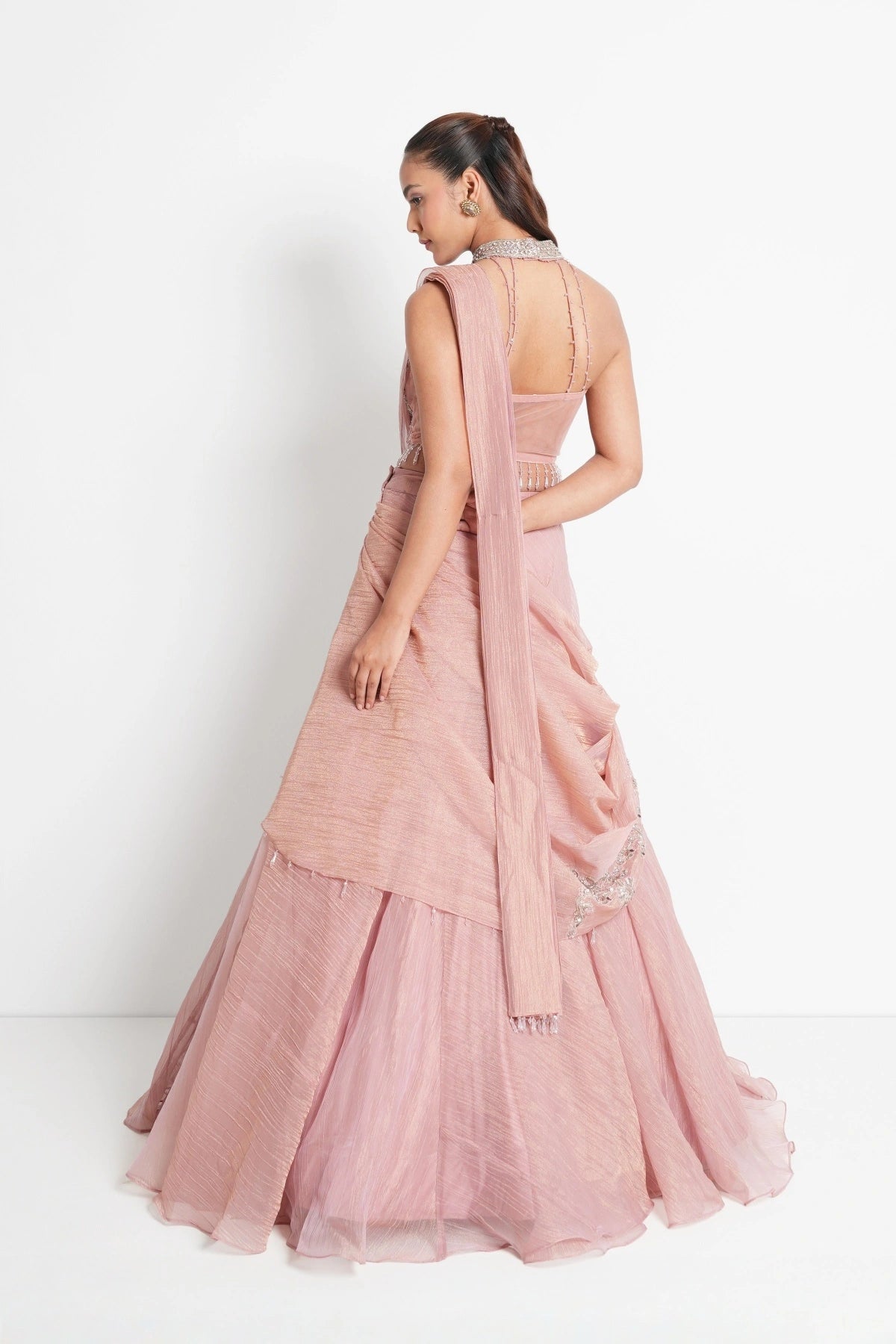 Antique Blush Pink Lehenga saree crafted in Tissue with halter neck blouse