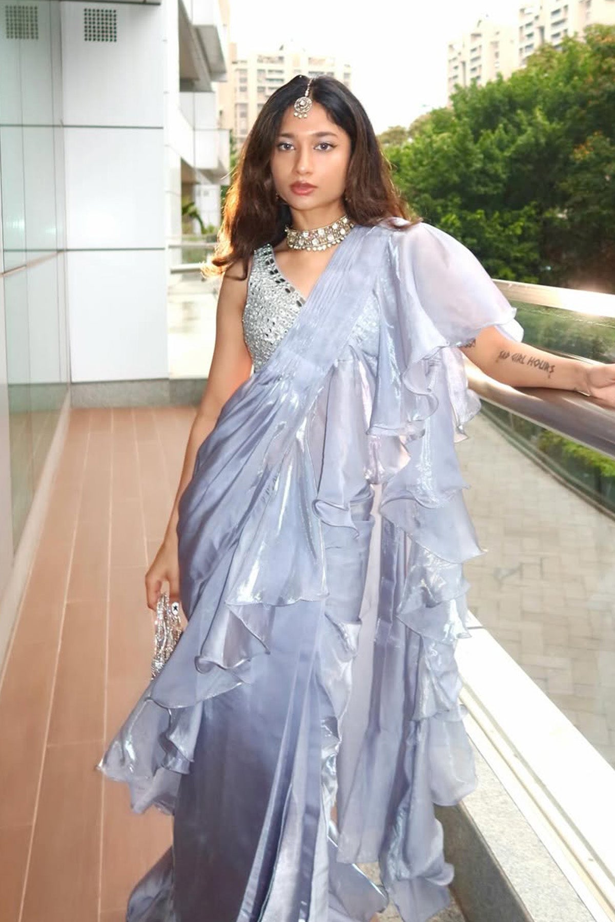 Celestial blue pre-draped saree with ruffle and mirror work blouse