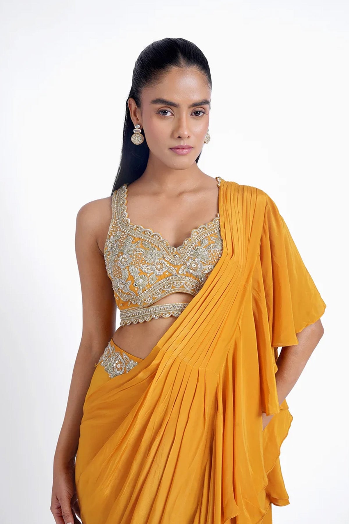 Chrome yellow ruffle pre-draped saree in crepe with hand embroidered blouse set