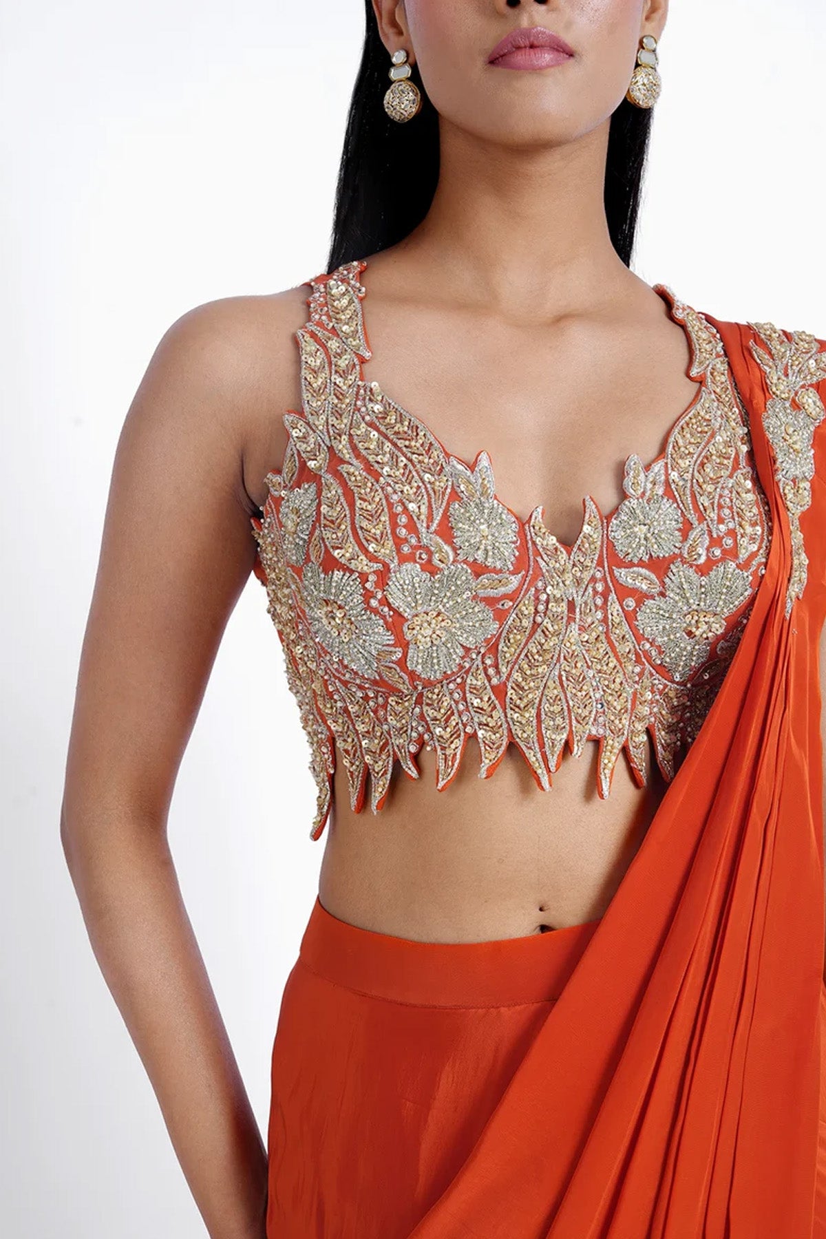 Orange pre-draped saree in crepe with katori style cutwork blouse set