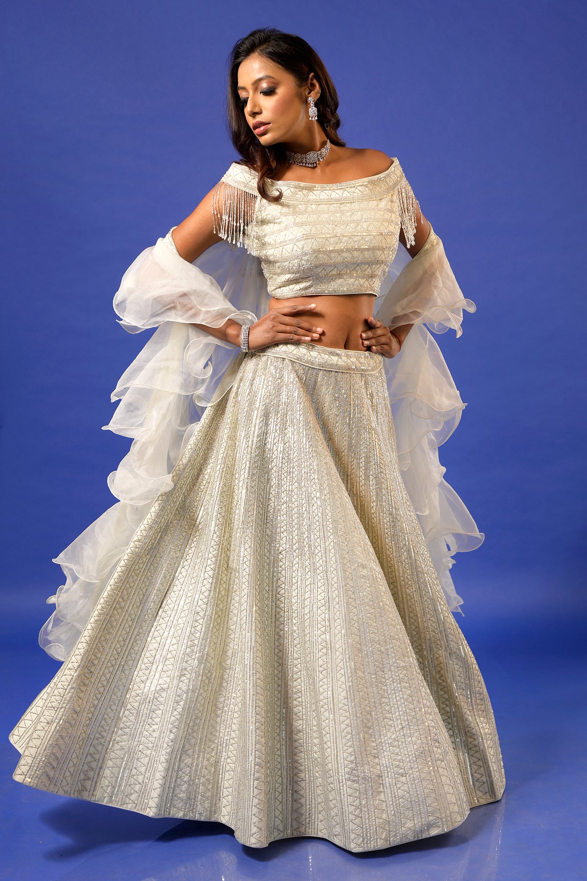 PANIHARI--Ice Blue Hand Embroidered Lehenga Set With an Off Shoulder Blouse and Ruffle Organza Dupatta